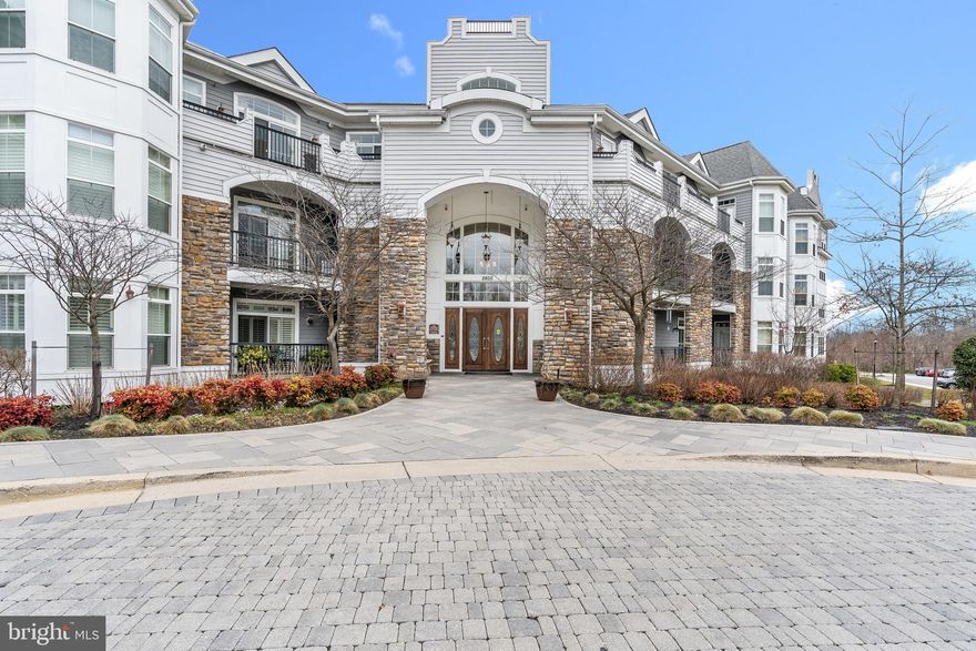 TRULY IMMACULATE, classy and sophisticated, this lake-facing unit offers a sunlit experience from the moment you step into the space! Gleaming hardwood floors in Living/Dining Rooms and den/office. New high-end carpeting in both Bedroom Suites.  The spacious eat-in Kitchen features stainless appliances, a home center/desk and fantastic pantry closet w/ custom organizer! All closets are customized with built-in organizers.   Balcony that offers sweeping views of Quarry Lake and the community, this unit offers the space - and storage - you need to enjoy an easy & comfortable Quarry Lake lifestyle!