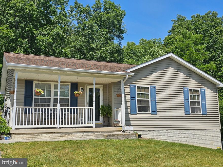 Spacious rancher with full, finished, walk out basement.   Main level offers 3 bedrooms, 2 full baths & large eat in kitchen.  The lower level has a huge rec. room, full bath with jetted tub, den and laundry room.  Fenced rear yard that backs to woods.  Freshly painted and new flooring.