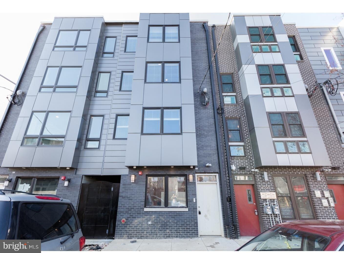 Beautiful and modern 2bed/2bath bi-level apartment located along the highly desirable Frankford Avenue arts corridor in East Kensington. This building has a secure entrance and is located close to Forin Cafe, Philadelphia Brewing company, and close to the subway stop. The first floor boasts an open floor plan with tons of natural light, hardwood floors, fireplace and a combined living and kitchen space. The gorgeous kitchen features stainless steel appliances, quartz counter tops and a wrap around counter providing extra work and sitting space. On the second floor you will find 2 large bedrooms each with their own en-suite full bathrooms, and large closets as well as washer and dryer. You will have access to two large shared roof decks to enjoy the sunsets and views of center city. Tenant responsible to pay $75 toward building water, pets on a case by case basis, easy application process.