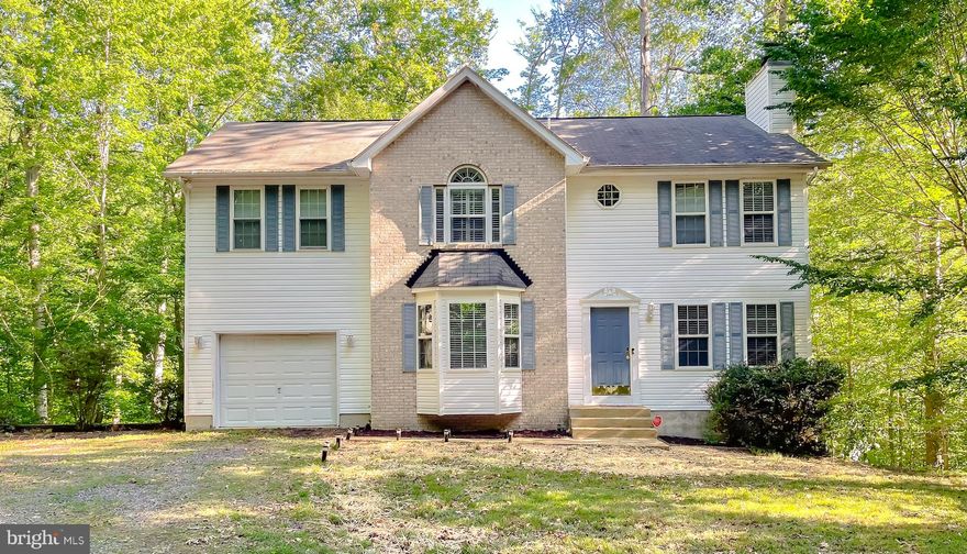 Bring your imagination and creativity. Such potential here! Approved short sale! in this Water access community. Large Colonial has open floorplan, wood floors, granite counters, stainless steel appliances, upgraded cabinets, finished basement with built in shelves and storage. Sitting room off primary bedroom could be home office or craft room or nursery. Large walk in closet with closet organizer and window for natural light when dressing and matching up accessories. Primary bath with dual vanities and soaking tub and separate shower, and the primary suite has separate laundry room. 2 other bedrooms on the upper level are good sized. This is a larger lot as several were combined into one, should be over 2 acres. Call for details. Septic pumped and passed.