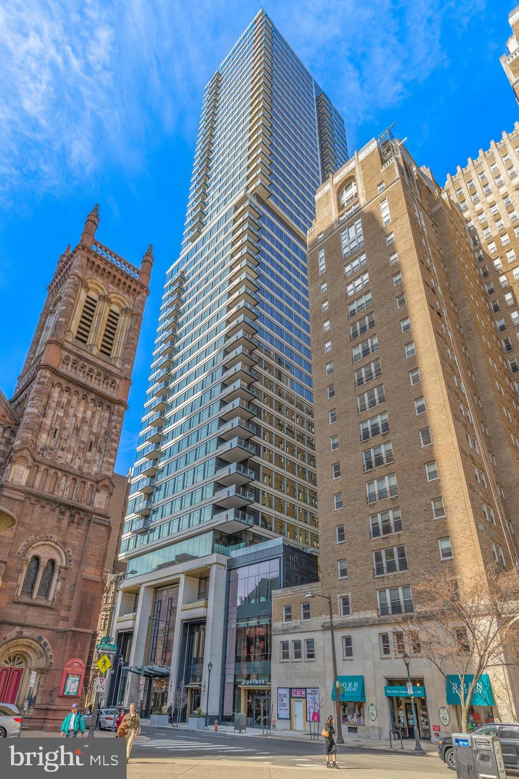 Welcome to The Laurel - Philadelphia’s Pinnacle of Luxury Living on the Square. Step into unparalleled elegance with this fully upgraded Sky Residence at the 33rd floor of The Laurel, Rittenhouse Square’s crown jewel. This exclusive residence has been thoughtfully enhanced with the most opulent finishes available—black marble flooring throughout, two private balconies offering stunning outdoor escapes, and a custom-designed Tribal Makassar wet bar that elevates the art of entertaining.
This expansive 2-bedroom 2.5 bath residence captures breathtaking views with floor-to-ceiling wraparound windows showcasing vibrant sunsets over the park from the primary suite and incredible city views from the living room balcony. Spanning 1750 square feet with soaring 10-foot ceilings, this home is the epitome of refined luxury city living.
The gourmet kitchen is a modern masterpiece, featuring sleek European cabinetry, quartz waterfall island, and top-of-the-line appliances including a Sub-Zero integrated refrigerator, Wolf gas cooktop, convection and steam ovens, Miele dishwasher, and drawer microwave. The adjacent open-concept living and dining areas are ideal for both intimate evenings and grand entertaining, especially with the seamlessly integrated, custom-upgraded wet bar.
The primary suite is a serene sanctuary boasting balcony access, a spa-inspired bath with radiant marble floors, a freestanding soaking tub, floor-to-ceiling porcelain tile, and an expansive glass-enclosed shower with designer fixtures.
Residents of The Laurel enjoy a host of white-glove amenities: 24-hour concierge, valet service, a state-of-the-art fitness center, indoor and outdoor saltwater pools, a luxe club room, and a landscaped terrace with panoramic views overlooking historic Rittenhouse Square.
One deeded parking space is included. Additional parking options available upon request. Elevate your lifestyle schedule your private tour today.