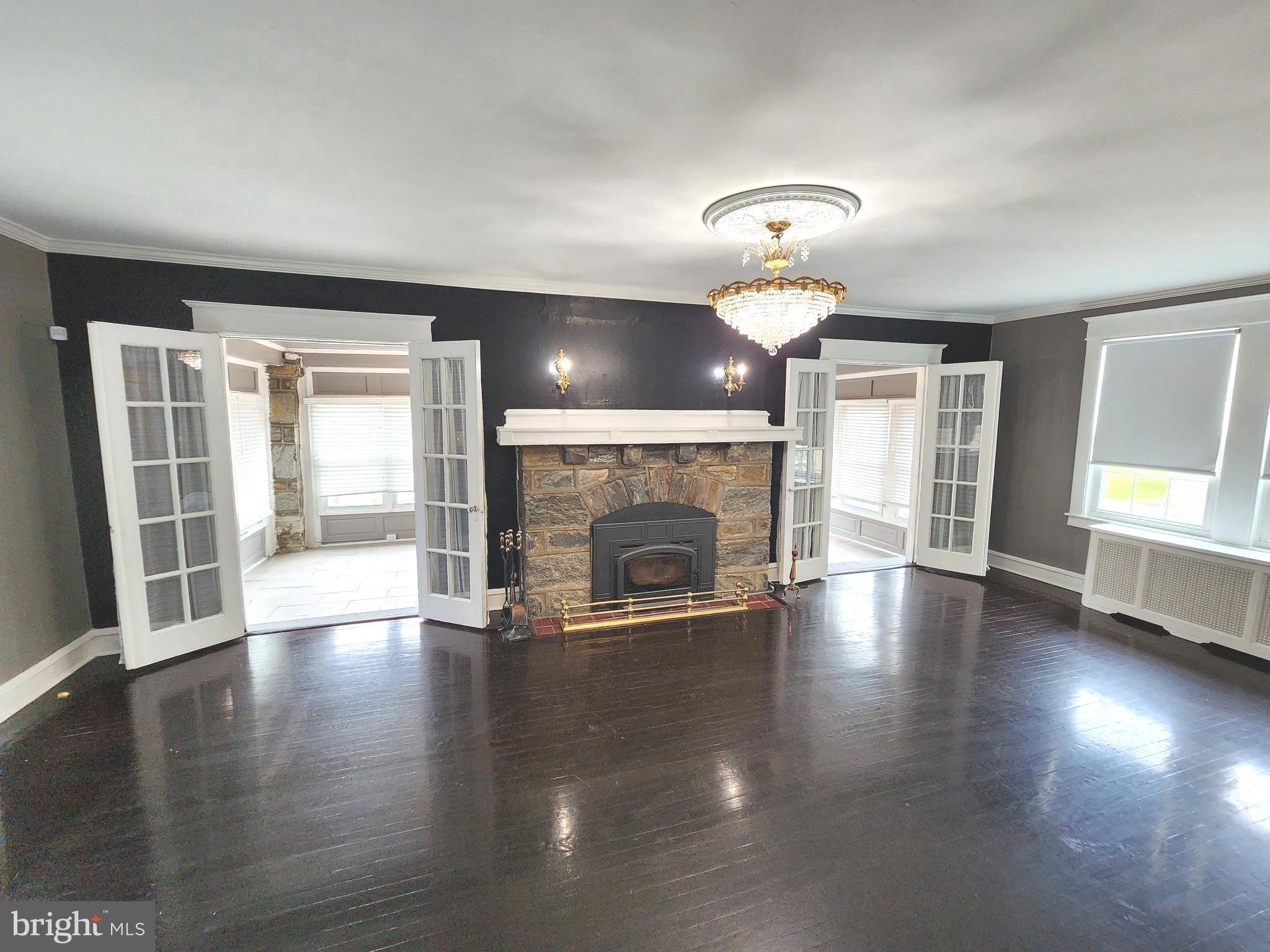 MOTIVATED SELLER
Welcome to this beautiful six (6) bedrooms, three and a half (3.5) bathroom home located in the heart of Lansdowne, Pennsylvania—a town celebrated for its welcoming community, tree-lined streets, and enduring charm. This home blends comfort, style, and convenience in an unbeatable location. Inside, you'll find six generously sized bedrooms, offering flexibility for guests, a home office, or even a gym.
The property boasts a spacious front yard, a large driveway, and a garage. Enter through the side of the home into a roomy foyer where the main staircase greets you. Just beneath the stairs is a charming half bath, the ultimate convenience. To the right, a bright & airy living room welcomes you in, centered around a beautiful wood-insert fireplace.
From there, step into a generous enclosed porch, flooded with natural light from three sides—a perfect spot for morning coffee or enjoying the view throughout the seasons.
Toward the rear of the home, a formal dining room creates a warm and elegant setting for meals and gatherings. The separate kitchen features matching stainless steel appliances and granite counter tops and offers plenty of functionality. Upstairs, the second floor includes four well-sized bedrooms and a full bathroom. On the third floor, you’ll find two more charming bedrooms with sloped ceilings, as well as two additional full bathrooms. Keeping with the charm is the original hardwood flooring.
Step outside into the backyard and discover an entertainer’s dream. A massive, raised deck offers plenty of room for grilling, dining, and gathering with friends or family—perfect for summer cookouts or evening hangouts under the stars. Below the deck, a covered, rainproof area provides a shaded retreat or an additional entertainment zone, no matter the weather. The walkout basement flows seamlessly to this outdoor space, making it easy to host guests both indoors and out. Whether you're planning a backyard barbecue, tending a garden, or simply unwinding with a good book, this private outdoor oasis was designed with lifestyle in mind.
Located in Delaware County, Lansdowne provides the perfect blend of peaceful suburban living with easy urban access. The neighborhood is renowned for its robust educational programs and diverse extracurricular activities. Local highlights include the historic Lansdowne Theater, a go-to spot for live performances and films, and Hoffman Park, perfect for enjoying nature. Residents also love strolling along the scenic Darby Creek Trail or exploring the local shops and eateries on Lansdowne Avenue.
Commuters will appreciate being just six miles from Philadelphia, with easy access via Lansdowne Station on the SEPTA Media/Elwyn Line or nearby highways. This home isn’t just a place to live—it’s a lifestyle. With its spacious layout, inviting outdoor areas, and a prime spot in a thriving community, this Lansdowne gem is ready to welcome you home. REVIEWING ALL OFFERS!