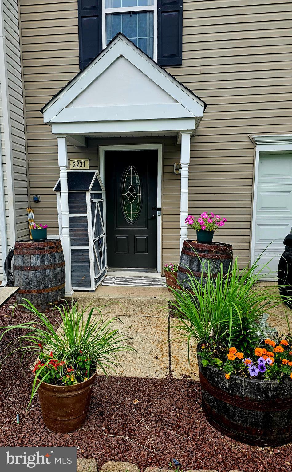 Welcome to this beautifully maintained 3-bedroom, 2.5-bath townhouse home offering an open floor plan, perfect for modern living and entertaining. Spacious eat-in kitchen and huge living room, Enjoy outdoor living on the beautiful deck with a pergola and providing a serene space for relaxation. This end unit backs to a private area. Enclosed fenced in backyard. Walkout basement. Master suite, complete with vaulted ceilings, a walk-in closet, and a private bath. Two more carpeted bedrooms with additional full bath complete with tub shower. 1st level offers a large foyer, family room for work, exercise or relaxation. Highlights include a one-car garage, efficient natural gas heating, and central air conditioning. The property also benefits from a low HOA fee of $100/month, covering common area maintenance, grass cutting and snow removal for easy living. This home is move-in ready and waiting for you to call it your own.