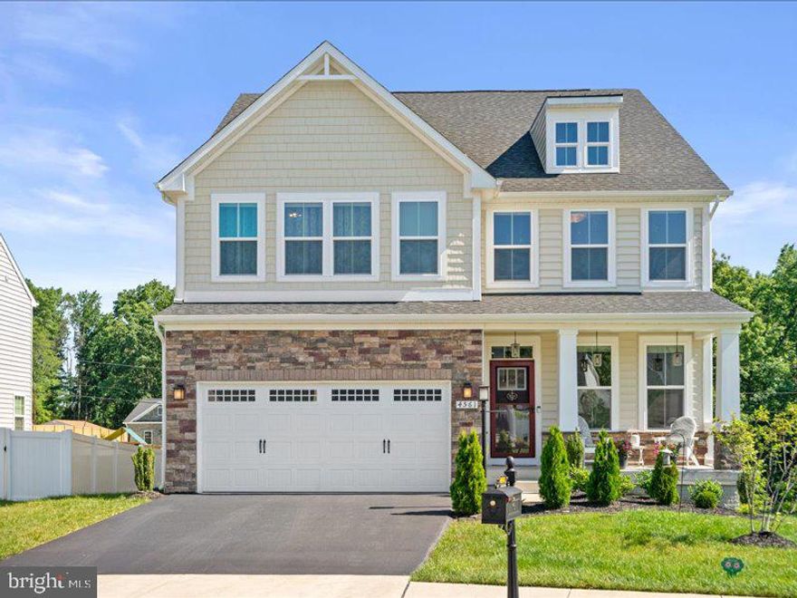 Assumable VA loan at 3.20%. Showings by appointment only. Welcome to this Ryan Homes Executive Series Hayworth style home in sought-after May's Quarter. Built in 2020, this multi-level home offers 5 bedrooms, 4.5 bathrooms, numerous added amenities, and ample natural light throughout. From the moment you step inside, you'll be greeted with an open-concept floor plan that seamlessly blends the spacious living room, dining area, and kitchen. The kitchen features top-of-the-line stainless steel appliances, including a gas cooktop, double ovens, and a large center island that offers ample space for meal prep and entertaining. The kitchen also boasts gorgeous quartz countertops, custom cabinets, and a convenient spacious pantry. The first floor also offers a separate office/den/study, guest bathroom, gas fireplace, and a mudroom for easy access to the spacious two-car garage. The upper level offers a total of 4 bedrooms, each providing walk-in closets. - The owner's suite is complete with a tray ceiling, two walk-in closets, and a spa-like ensuite bathroom with a soaking tub, separate shower, and dual vanities. - The 2nd and 3rd spacious bedrooms have walk-in closets and share a Jack- & -Jill full bathroom with dual vanities. - The 4th bedroom is equal in size to the others and has its own walk-in closet, and a full private bathroom. - A convenient laundry room is also on the upper level with generous upper cabinet space and plenty of space and connections for modern washers and dryers. The fully finished basement provides a spacious sitting area for entertaining, an additional 5th bedroom, a private fully finished media room, and a full bathroom with a walk-in shower. The utility room provides easy access to excess storage and all home heating, cooling, and electrical essentials. Additionally, the basement is fitted with plumbing to add a wet bar if desired. Other notable features of this home include: - Rear and side not-fenced yards provide beautiful views. - A roomy 2-car garage with Wi-Fi enabled garage door opener - A 7-zone sprinkler system was added in 2021. - Composite 12' x 20' rear deck with remote-controlled awning. - Wi-Fi-enabled smart thermostat. - Pre-wiring for HDMI/Internet hub placement. The home sits adjacent to a stormwater management pond and a local neighborhood road to the rear, meaning there is only one neighbor, lots of privacy, and beautiful natural views all year round! Located on the edge of Woodbridge and Manassas, this home is just a short drive from shopping, dining, and entertainment options. The home is zoned for Sonnie Penn Elementary School, Louis A. Benton Middle School, and the highly sought-after Charles J. Colgan High School. Situated on a secluded loop-street, this home is just minutes from the I-95 (Express lanes), multiple bus stops, and numerous Commuter lots serving the Washington DC & Pentagon area.