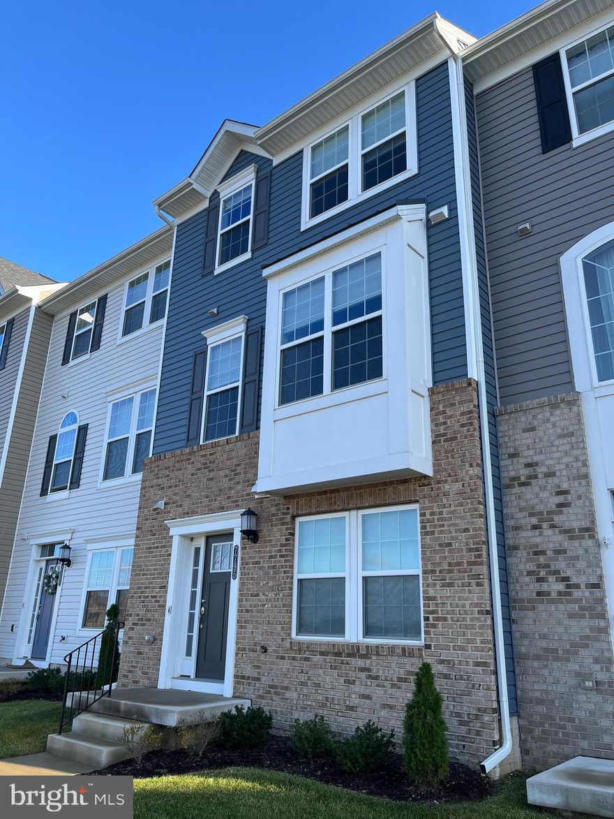 Welcome home to this **beautiful 3-bedroom townhome**, built in **2021** and thoughtfully designed for both comfort and style. With **2 full baths, 2 half baths**, and a **2-car garage**, this home offers modern convenience at every turn.

Step inside to find **sun-filled living spaces** where light spills in from every angle, creating a bright and welcoming atmosphere. The **open floor plan** seamlessly connects the living, dining, and kitchen areas—perfect for everyday living and effortless entertaining. At the heart of the home is a **gourmet kitchen**, featuring a **large island**, **stainless steel appliances**, and plenty of workspace to inspire any home chef.

You’ll love the **luxury vinyl tile floors** throughout the main level, paired with **soft carpeting in the bedrooms** for added comfort. A **first-floor office** provides the ideal spot for remote work, creative pursuits, or quiet study. Upstairs, enjoy the convenience of **laundry on the upper floor**, keeping day-to-day routines simple and efficient.

After a long day, retreat to the maintenance-free deck—a restful space perfect for unwinding or enjoying a morning cup of coffee. Between the **garage, driveway, and plentiful street parking**, you’ll always have room for you and your guests.

Warm, inviting, and nicely appointed, this home is truly a **wonderful place to live**.

**Schedule your appointment today and come see everything this beautiful home has to offer!**