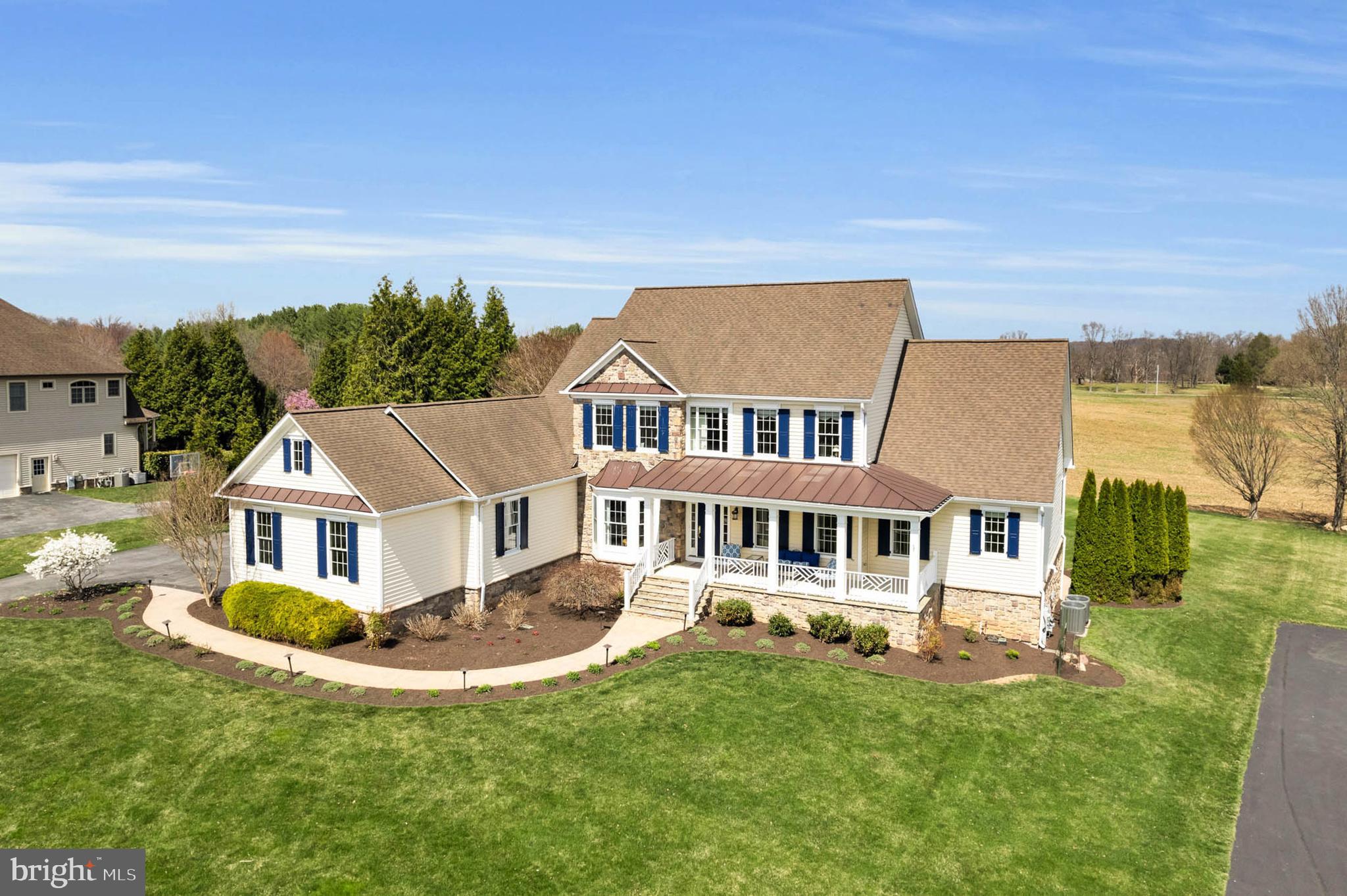 Prepare to be enchanted by this magnificent custom-built residence, boasting over 5,200 finished square feet and nestled on just under an acre of meticulously landscaped and hardscaped grounds. This home artfully combines comfort and luxury, creating the ultimate sanctuary for modern living.
Step into the impressive gourmet kitchen, a culinary enthusiast's dream! Featuring stunning Monogram appliances, elegant granite countertops, a spacious island with a breakfast bar, a gas cooktop complemented by a stylish range hood, double wall ovens, and a built-in microwave and wine fridge, this kitchen is designed for both functionality and elegance.
Adjacent to the kitchen, the grand two-story family room invites you to unwind by the cozy gas fireplace, creating a warm and inviting atmosphere. The main level also showcases a sophisticated formal dining room adorned with exquisite crown molding and chair rails, complete with new custom curtains that enhance the room’s elegance. The welcoming living room features refined architectural details, and a sophisticated library complete with French doors—perfect for quiet reading or a productive workspace.
Retreat to your luxurious main-level master suite, an ideal escape at the end of the day. The en-suite master bathroom offers a spa-like experience with dual sinks, a large soaking tub, and a spacious walk-in closet that provides abundant storage. Family and guests will enjoy the upper level, which features four additional well-appointed bedrooms, each with its own en-suite full bathroom, freshly painted and adorned with new, sparkling hardwood flooring, ensuring privacy and comfort for everyone. The convenience of a main-level laundry room with a new washer and dryer, along with a large mudroom equipped with a pet shower, enhances everyday living.
For even more entertaining space, venture down to the finished basement, where you'll find a lively game room complete with a pool table, a serene den, a sixth bedroom, a full bathroom, an exercise room and a generous unfinished storage area, all featuring new carpeting and fresh paint.
If outdoor entertaining is your passion, this home is truly a dream come true! Access the stunning low-maintenance deck from either the kitchen or the main-level master bedroom, leading to a charming flagstone patio complete with a built-in firepit and delightful water feature. The stamped concrete lower patio further enhances your entertaining options, providing ample space for gatherings both indoors and outdoors. Plus, your furry friends will be safe with an electric fence, and two collars will be included.
Don’t miss the opportunity to call this extraordinary property your home!