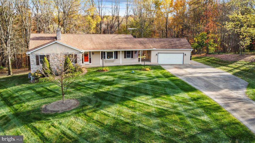 Welcome to your dream home in the sought-after Tannery Manor neighborhood of Westminster. This custom-built 4-bed, 3-bath rancher has been cherished and meticulously maintained by its original owners, offering a warm and inviting place for families to call home. It provides the perfect blend of rural living and modern convenience, just a short 2-mile drive from Westminster, 7 miles from Hampstead, and 15 miles from Eldersburg, it gives you the opportunity to enjoy the very best that Carroll County has to offer. It is situated within one of the best school districts in the county, including Winters Mill High School, East Middle School, and Cranberry Station Elementary. Did I mention that all this comes with the benefits of no city taxes and no HOA restrictions or fees? 

The owners handpicked the builder and the lot in 1992 and have loved living here ever since. Sitting on a generous 5-acre lot, this property offers endless possibilities, from gardening and raising animals to setting up a personal shop in the spacious basement. As you walk in the front door, you'll notice that the entire first floor has been completely remodeled. Updated throughout with luxury vinyl flooring and a fresh coat of paint, providing a blank canvas for you to make the house your own. Gather around the wood stove in the living room and enjoy evenings with family and friends. Enjoy the spacious, eat-in kitchen with sleek granite countertops, stainless steel appliances, and a breakfast bar, creating a perfect setting for memorable family meals. The primary bedroom is a private haven, complete with a beautifully finished primary bathroom for moments of relaxation and rejuvenation. Three additional bedrooms are included on the first floor to ensure ample space for a growing family or visiting guests, as well as a main-level laundry room with a sink. The large walk-out basement with a 10 ft. ceiling and steel shelving is perfect for hobbies, while the active radon mitigation system provides peace of mind. Take in the beauty of the private, wooded backyard from the inviting three-season room while sipping your morning coffee or a midnight cocktail. Let's not forget about the oversized 2-car garage with heavy-duty storage shelving to help take care of all your automobile and outdoor projects. 

With zoning that allows conservation and farm use, this home is a haven for those seeking a peaceful, unencumbered lifestyle. Surrounded by lush trees on a quiet street, the spacious breezeway sets the tone for a life of tranquility and comfort. Make this one-of-a-kind rural gem your own. Schedule a showing now and embrace the potential this home has to offer. 

The homeowners have graciously provided a full tank of oil and an active service policy on the HVAC and oil tank until 03/24, which will be honored with the sale of the property. 

Updates Include: All brand new appliances including refrigerator, range, dishwasher, washer, dryer, and disposal. New granite countertops and backsplash. Luxury Vinyl Plank Flooring. New ceiling fans and lighting. Completely renovated bathrooms. Fresh paint.