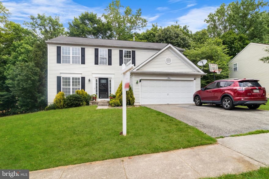 This beautifully maintained colonial home in the sought-after Collington Estates is a perfect fit for your family's needs. It boasts four spacious bedrooms, including a stunning primary suite with a luxurious en suite bathroom. The updated kitchen, complete with modern appliances and stylish finishes, seamlessly flows into the breakfast area and family room, where you'll find a cozy gas fireplace—ideal for family gatherings and relaxation.

Step outside from the kitchen onto the two-story maintenance-free deck, which overlooks serene woods and features a convenient covered section, perfect for outdoor entertaining in any weather. The fully finished basement offers additional space for recreational activities and includes a full bathroom and a walkout to the backyard, providing easy access to outdoor fun.

This home is the one you've been waiting for. Schedule an appointment to view it today!