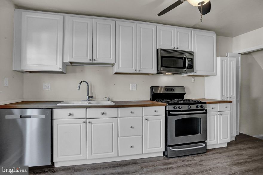 Stunning home and incredible location close to many schools, universities, shopping, beltway and the city. Parking in the rear, 2 covered porches for outdoor living, fenced backyard, shed. Ceiling fans in every bedroom and the living room and kitchen. Updated bath & kitchen.