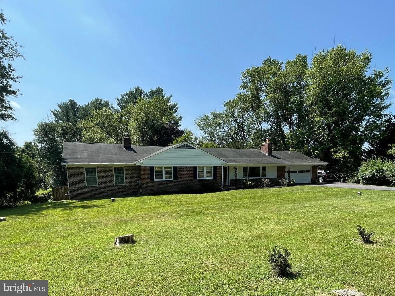 Welcome to 1515 Ivy Hill Rd! This spacious 5-bedroom, 3-bath brick ranch sits on a full acre in the always-popular Falls Road Corridor. Built in 1965 and expanded in 2004, the home now offers just over 3000 square feet of finished living space with a classic, easy-flowing layout.
As you walk in, you're greeted by a cozy living room with a wood-burning fireplace. The large eat-in kitchen has plenty of room to host friends and family. On the main level, you’ll find the primary bedroom with a private bath—renovated in 2023—plus four more bedrooms and another full bath, also updated in 2023.
Downstairs, the roomy lower level includes a rec room with a fireplace, a kitchenette, and sliding doors that open to the in-ground pool (which was completely rebuilt in 2020). Just beyond the rec room, a large unfinished area also offers French doors to access the pool. This area is ready for your personal vision and customization. A freshly paved driveway (2023) leads to an attached two-car garage.
Come see it in person at our Open House on Saturday, July 12th, from 1–3 PM.