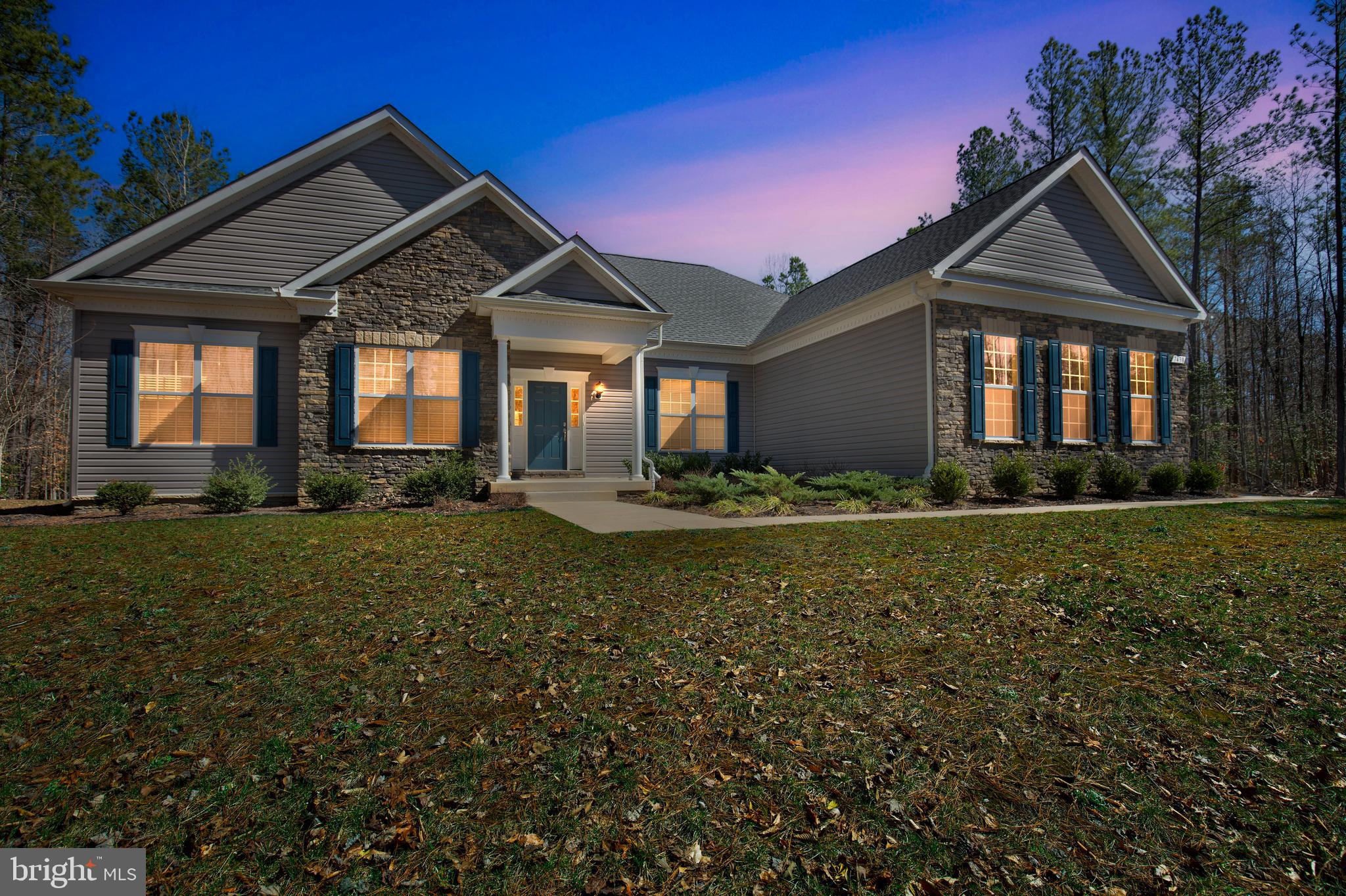 Welcome Home! Why wait or pay for new construction when you can move right into this stunning, nearly new custom-built Marrick Home? This expansive rambler offers 4,150 square feet of beautifully designed living space with an open floor plan perfect for modern living. Step into the gourmet eat-in kitchen, where you'll find stainless steel appliances, granite countertops, a spacious center island with a breakfast bar, and a large walk-in pantry. A separate mudroom/laundry area adds convenience to your daily routine. The huge finished basement provides even more versatility, featuring a full bath, a large bedroom/home office, and ample space to add an in-law kitchen if desired. Nestled at the end of a peaceful cul-de-sac, this home sits on a private 2-acre lot backing to trees. Relax and unwind on the screened-in porch while enjoying the tranquil surroundings. 2-car side-load garage and an unbeatable location