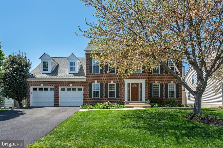 Highly attractive brick front 4 bed 3.5 bath home w/ beautiful hard wood floors, updated kitchen and baths, granite counter tops, spa master bath suite, bay windows, built in bookshelves in the family room, finished basement w/full bath, screened in porch w/additional patio for grilling, fenced yard w/professional landscaping. A quarter mile from Frying Pan Farm Park for your family to enjoy!