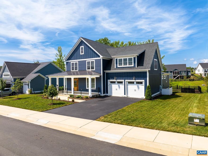 Welcome to refined living in Spring Creek, one of Central Virginia?s premier gated golf course communities.  Built in 2022 by Evergreen Builders, this exceptional St. Charles model offers 4 bedrooms, 3.5 baths, and flexible living spaces designed for comfort and modern living.  A rare feature is the dual primary suites, each with it's own laundry areas as well as private en-suite bath?ideal for guests, extended family, or multi-generational living.   The original fourth bedroom was designed to open to the spacious bonus room with concealed rough-in plumbing, offering potential for a third primary suite, huge media room, office, or wellness space.  Enjoy outdoor living from the fenced semi wrap-around front porch or the fully fenced backyard, perfect for entertaining, pets, or play. The rear patio overlooks a partial conservation area, providing peaceful sunset views and added privacy.  Spring Creek offers private championship golf, clubhouse, pool, fitness center, and walking trails, minutes from Zion Crossroads with easy access to Charlottesville and Richmond.  Interior video virtually staged. Listing agent is owner.,Granite Counter,White Cabinets,Wood Cabinets,Fireplace in Great Room