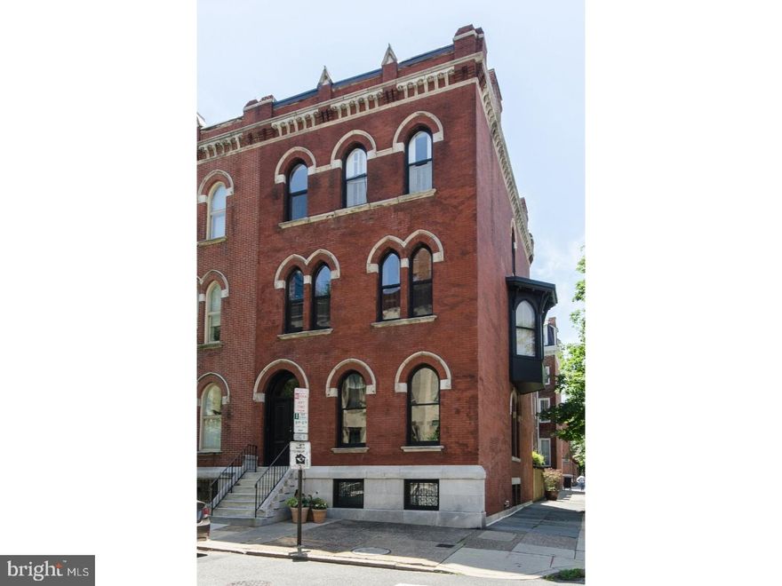 Beautiful Rittenhouse Square Victorian Mansion (1860s) on Premier St. James Street. This corner home with North, West and South exposures, attributed to Frank Furness, has high ceilings, windows on three sides, a garden and deluxe cook's kitchen. First floor features beautiful double door foyer entrance. Three beautiful connected open rooms currently used as living space with built-in shelving, wood floors and wood mantel with tile hearth. Powder room off the hall. Lower level has new super custom cook's kitchen with Wolf dual-fuel range, custom stainless countertops and sink, slate floors and Italian Ash custom cabinets. Spacious and bright dining room with brick mantel, great bookshelves and Architect designed metal doors to sunny back garden with bluestone pavers, custom wood fence and gate to 23rd Street. Second level currently used as a master suite with South and West facing siting room, sunny center 4-piece bath and large front master bedroom with wall of custom millwork closets, decorative mantel and shelving. Additional powder room also on this level off the hall. Third floor has full hall bath, wood floors,  bright back bedroom, small front bedroom and additional front bedroom with en-suite full bath and decorative mantel with stone surround. Amazing location close to Rittenhouse and Fitler Squares, Universities, 30th Street Station, Schuylkill River Trail and Park, shops, restaurants, entertainment and all Center City has to offer.