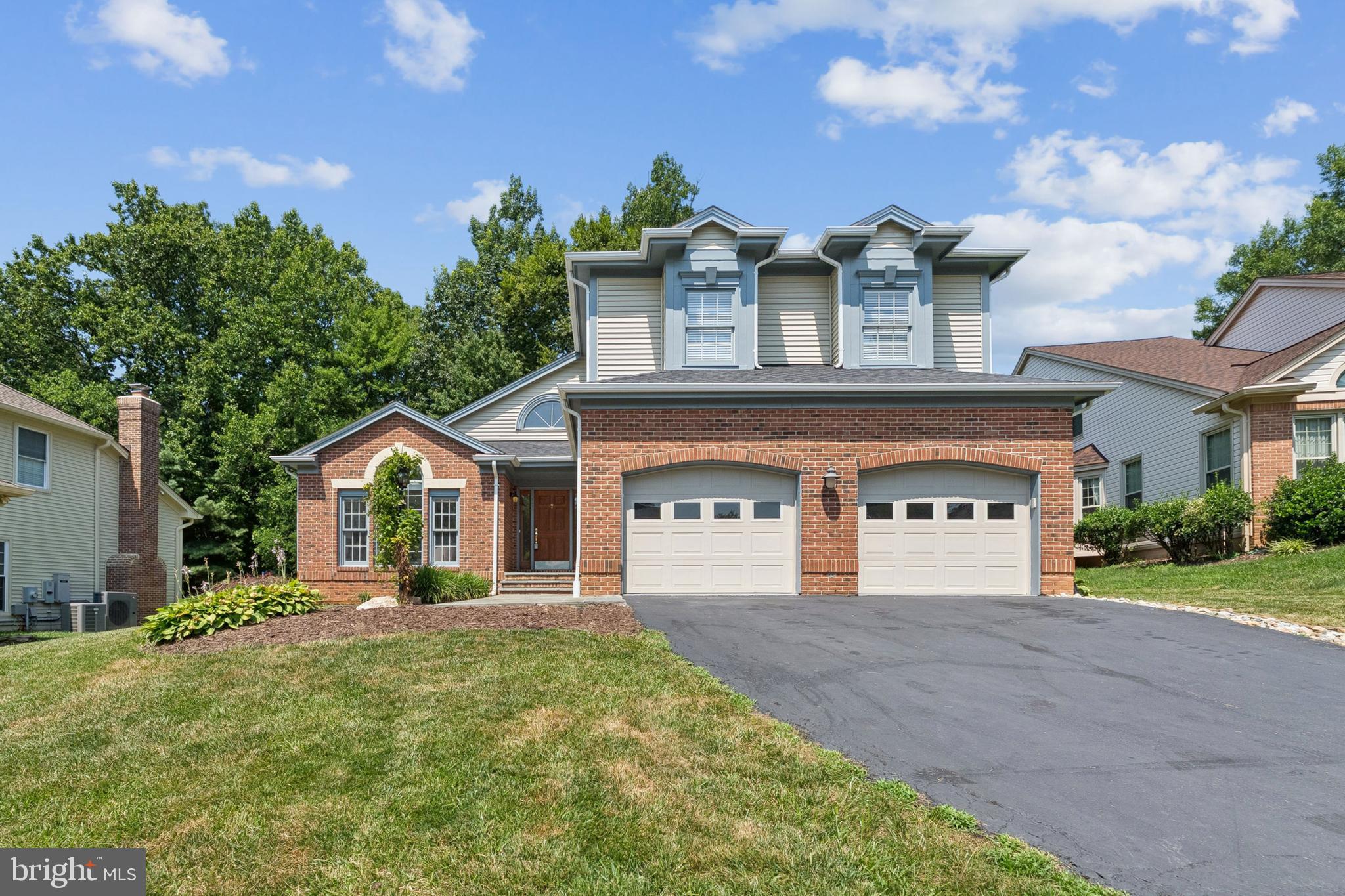 Beautiful home with 5 bedrooms and 4 full bathrooms. Main level has gleaming hardwood floors, cathedral ceiling in the foyer, fantastic kitchen with stainless appliances, center island, eat in table area and open to both the backyard deck and family room. Architectural arches separate the living and dining room. The spacious family room with wood burning fireplace is a great gathering place for family and friends. Upstairs are 4 very large bedrooms. The master has a coffer ceiling, ceiling fan and a walk in closet. The master bath has dual sinks, separate big corner bath and a shower. The hall bath has dual sinks and a tub/shower combo. Each of the bedrooms are oversized and one has built in shelves, a bench for storage and they all have ample natural light. The lower level has another bedroom with room for a sitting area. There is also a huge family room and another bonus room that leads up the steps to the backyard. The back yard is amazing. There is a deck for lounging, a gazebo for dining and so much yard space for playtime. The two car garage and an abundance of storage makes this the perfect home for you! ***UPDATES: Roof: 2022; Basement refinished: 2021; Exterior and interior painting: 2025; Garage floor redo and painting: 2025; Landscaping: 2025; New vanities in primary and upstairs hall bath: 2025; Stained deck: 2025; Dishwasher and microwave: 2025