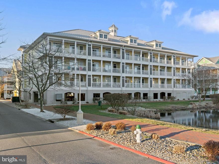 This is the one you have been waiting for and now your patience has paid off.  This well sought out building in Sunset Island has just the right spot for you to make beautiful memories with your family and friends.  It is close to all of the amenities that Sunset Island has to offer . . .  you're just steps away from the pool and private beach area, as well as the Clubhouse and convenience store. This condo has soaring cathedral ceilings from the Kitchen to the Great Room, plus 9' ceilings throughout the bedrooms.  From the balcony you will enjoy views of the pond and fountains and watch all the wildlife that lives in the pond and courtyard.  This owner has much pride in ownership and it shows.  Unit is gently used and will offer years of pleasure for you.  There is still time to snag this one and get it ready for your summer adventures.  Just add your personal touches and you are all set.  One . . .  Two . . . Three. . .  Ready . . .  Let's go!  Call before this one is gone.