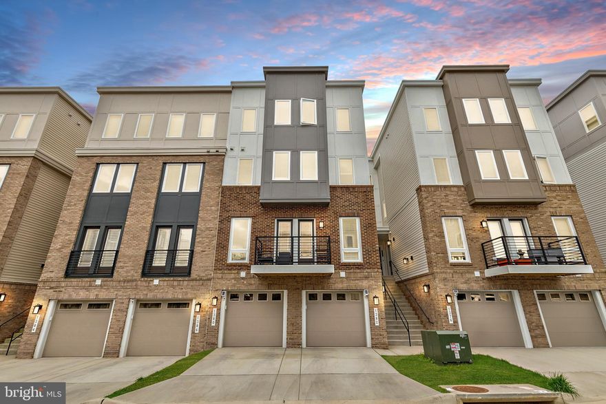 Welcome to your dream home nestled right next to the serene Featherstone National Wildlife Refuge! This townhouse style condo offers the perfect blend of modern luxury and natural beauty.
Convenience meets comfort for commuters with a short walk to the Rippon Station Virginia Railway Express Station.

Step inside to discover newer modern construction, which is move-in ready and in immaculate condition with numerous upgrades throughout. Spanning four levels, this condo boasts a 1-car garage, and three living area levels, providing 1856 total square feet of living space.

This stunning abode features 3 bedrooms, 2.5 bathrooms, including a luxury master bath with upgraded tiling. The open main level concept is ideal for entertaining and leads to a charming balcony, perfect for relaxing after a long day’s work.

Experience the convenience of a smart home equipped with a Ring camera and alarm system. Luxury hardwood flooring graces the main level, complementing the gourmet kitchen complete with quartz counters, upgraded stainless steel appliances, a large kitchen island with breakfast seating, crown moldings, and recessed lighting.

Ascend to the upper levels to find a large master bedroom featuring a trey ceiling, ceiling fan, and spacious closets with custom built-in shelving. The washer and dryer are located in the upper level.

Additional highlights include large 2nd and 3rd bedrooms, with walk-in closets, ensuring ample space for family or guests.

The neighborhood is minutes from Potomac Mills Shopping Mall, Stonebridge Shopping Center, several Prince William County Parks, and many dining options.

Don't miss the opportunity to call this meticulously designed and thoughtfully upgraded condo your home. Schedule a showing today and embrace luxury living and an ideal commuting situation with the VRE within walking distance!