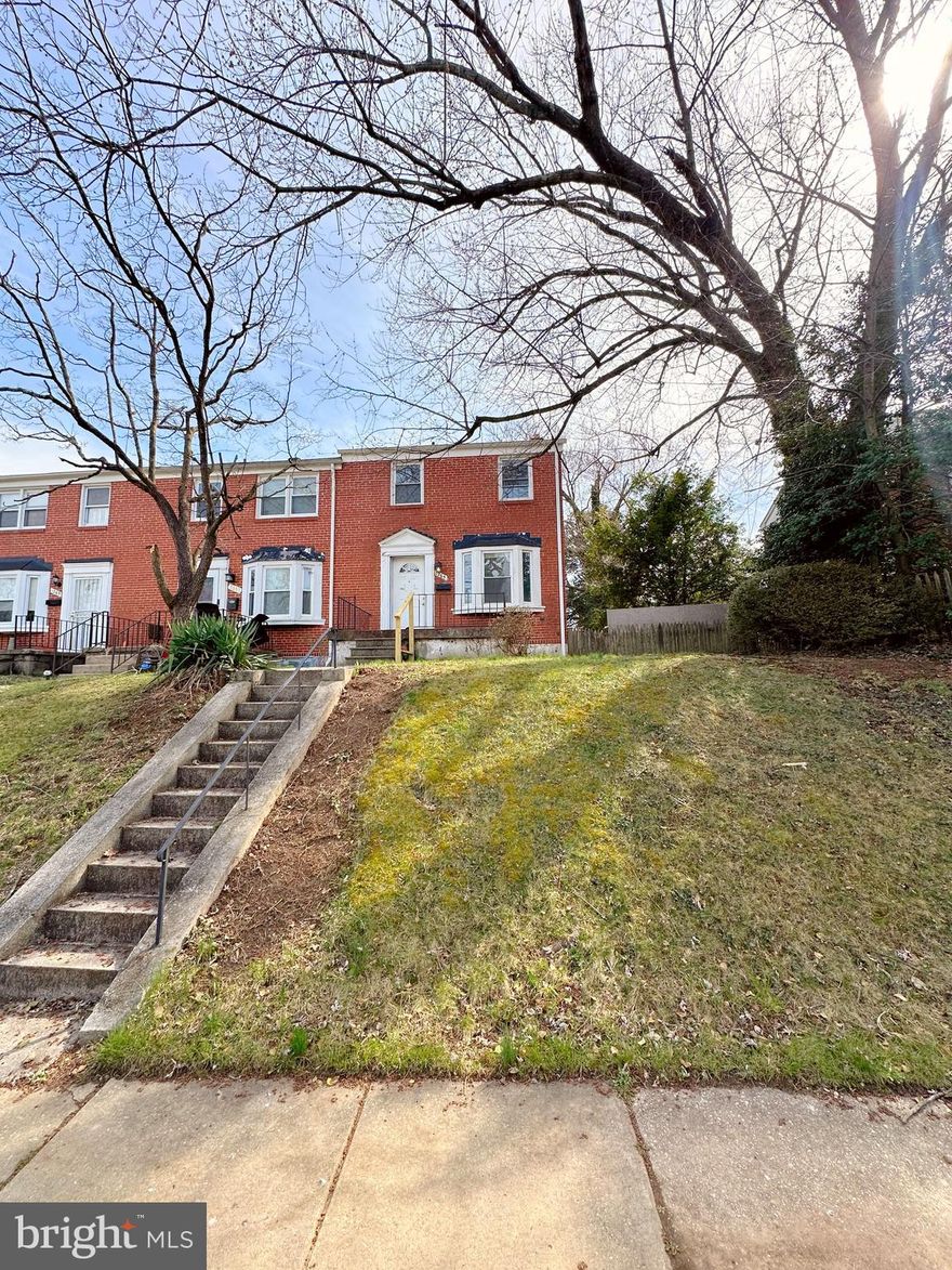 Welcome to this charming end-of-row townhome, ideally situated in the tree-lined community of Idlewood. Conveniently located near Chinquapin Run Park, Morgan State University, and Medstar Good Samaritan Hospital, this home offers both comfort and accessibility.

Step inside to discover natural hardwood floors, an open-concept living room and dining room area, and an abundance of natural light throughout the main level. Upstairs, you’ll find three spacious bedrooms and one full bathroom. The lower level offers a versatile bonus space that can be used as a fourth bedroom, home office, or additional entertainment area, the possibilities are endless. Enjoy outdoor living on your private deck overlooking a fully fenced backyard. The property also includes a convenient parking space located behind the home.

Whether you’re an investor or a buyer looking to add your personal touch, this home presents a fantastic opportunity. The sellers are open to providing a credit toward updates—making it even easier to create your dream space. Home is being sold As-Is.

Don’t miss out on this wonderful opportunity!