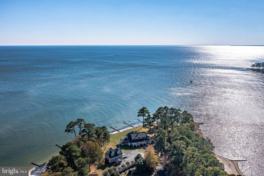 Welcome to luxury living at its very best! This incredibly private Northern Neck Retreat on the Chesapeake Bay & Taskmaker Creek is the perfect vacation get away, family compound or your dream forever home. The home can be purchased fully furnished, so you can start enjoying your new home from day one!!! This beautiful 4B/3.5B home will absolutely take your breath away with astounding water & wildlife views, a protected private sandy beach with a BRAND NEW pier + a covered boat/jet ski lift with shore power (water, electric & lighting).  Situated on more than 2 acres, this home offers abundant living & entertaining space indoors and out. For boating enthusiasts, there is a detached 2-car/boat garage with an additional private expansive space (could be used as a guest suite/office/playroom) with bay views. This property is the perfect escape from the hustle and bustle of the DC/Richmond Metro areas, even for a short weekend. The home is within 2.5 hours’ drive of DC and 1.5 hours from Richmond. 
Enjoy and watch the amazing diversity of wildlife: bald eagles, herons, swans and shoreline birds + abundant sea life. Swim or launch your kayak, paddle board from the concrete boat launch or your private sandy beach and head to the Creek and/or out into the Bay. Bring your jet skis or boat! 3 ft. MLW. On nice evenings year-round, finish the day sipping cocktails at the end of the NEW expansive Pier, enjoy endless water and wildlife views & the rhythmic sounds of gentle waves to lure you to sleep or just step down on your private beach and roast marshmallows around the fire pit. Either way, you’ll enjoy the most incredible Bay and Creek sunsets & sunrises. You can watch the 4th of July Reedville Fireworks from your pier/beach!
Meticulously maintained by the owners, this spacious home NNK Cape Cod home seamlessly flows for entertaining with a relaxed great room and dining area with walls of windows and French doors opening onto a stone patio that runs the length of the home and showcases unobstructed views of the Chesapeake Bay & Taskmaker Creek. 
Step out into your spacious private bayside screened porch to enjoy your morning coffee or relax in the evenings by watching the lights of the Smith Point Lighthouse and the giant cargo/cruise ships & sailboats illuminating their path through the Chesapeake Bay. 
The extraordinary features of this home make it ideal for entertaining, quiet family gatherings or a crowd. The home boasts 4 large bedrooms with the primary with an ensuite bath & an additional office/bedroom on the main level. Upstairs offers 3 additional bedrooms + 2 full baths on that level. One bedroom upstairs has an attached study/nursery. All rooms offer with Bay or Creek views. Main level laundry. NEW Whole-house backup generator & very large, detached storage shed with an outside rack for kayaks, paddleboards and sailboat space. 
Home CAN be purchased “TURN-KEY” fully furnished (except for family heirlooms), water toys (kayaks, paddle boards), games (croquet, badminton) & golf cart. All you need to bring is your bathing suit and toothbrush! More than $250k+ in Improvements & Upgrades: Complete interior painted 2026, New Whole House Generator 2025, New Refrigerator, Washer & Dishwasher 2025, Reconstructed/Restored Breakwaters/groins and Replace Pier 2024, Renovate interior of Boat House 2024, Moen Flo Smart Water Monitor/Turnoff 2024, Encapsulated crawl space with new humidifier. No HOA, private well and public sewer. No HOA. *There is an annual fee for road maintenance approximately $100 – 150 for all residents of Taskmaker Lane. Offering the perfect blend of comfort, style, and convenience, this home makes an excellent bayside home, or a perfect vacation rental too. Call today to set up your private showing! This beautiful property won't last!
Please see agent’s notes in BrightMLS. Schedule showings online through ShowingTime or by calling the listing agent directly. Minimum 48 hour notice preferred.