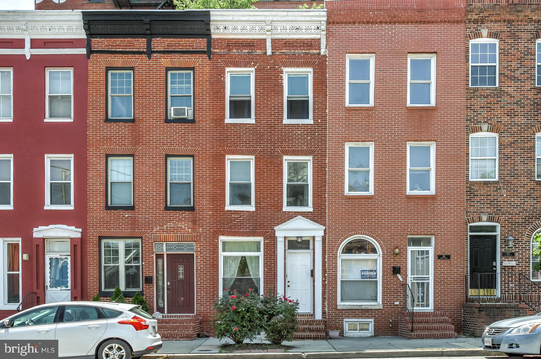 Just listed! Renovated 3-story rowhome in the heart of Pigtown! This move-in ready home features 3 bedrooms, 1 full bath, and an updated kitchen with new granite counter tops. The living room is highlighted by exposed brick, tall ceilings, and lots of natural light. The separate dining room is adjacent to the modern kitchen which leads to the yard. The second level includes a bedroom, a den/office, laundry closet with full-sized, stacked washer and dryer, and a just updated full bathroom. The third level offers 2 more spacious bedrooms. All bedrooms are large and equal in size with plenty of closet space. The basement is unfinished and provides additional storage for the home. Major improvements by the current owner include new windows, new flooring, laundry units, fresh paint, and more! Located within walking distance to Downtown Baltimore, Stadiums, Federal Hill, the University of Maryland Medical Center & Campus. Easy access to I-95, I-295, MARC and Amtrak trains. **3D Tour AVAILABLE**