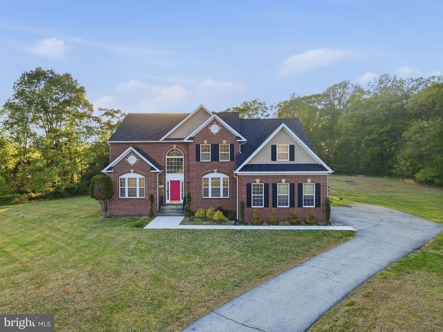 Welcome to 19081 Poplar Ridge Rd—a spacious home located on a peaceful street in the heart of Brandywine. Recently updated throughout, this residence offers 5 bedrooms, 3.5 bathrooms, and over 6,000 square feet of finished living space. The open-concept layout features a gourmet kitchen with quartz countertops, stainless steel appliances, and a large center island perfect for entertaining. A sunlit two-story family room with a cozy fireplace anchors the main level, creating a warm and inviting atmosphere that flows seamlessly into the dining area and formal living room. Upstairs, the luxurious primary suite boasts dual walk-in closets and a spa-inspired bath with soaking tub and separate shower. Additional bedrooms are generously sized with ample closet space. The fully finished basement includes a large recreation room, guest suite, and walk-out access to the backyard. Set on over 4 acres, this property offers exceptional privacy, a spacious yard, and a three-car side-load garage with inside access and additional storage. No detail has been overlooked—this home is move-in ready and waiting for its next chapter.
