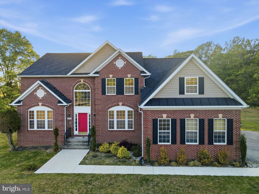 Welcome to 19081 Poplar Ridge Rd—a spacious home located on a peaceful street in the heart of Brandywine. Recently updated throughout, this residence offers 4 bedrooms, 4.5 bathrooms, and over 6,000 square feet of finished living space. The open-concept layout features a gourmet kitchen with quartz countertops, stainless steel appliances, and a large center island perfect for entertaining. A sunlit two-story family room with a cozy fireplace anchors the main level, creating a warm and inviting atmosphere that flows seamlessly into the dining area and formal living room. Upstairs, the luxurious primary suite boasts dual walk-in closets and a spa-inspired bath with soaking tub and separate shower. Additional bedrooms are generously sized with ample closet space. The fully finished basement includes a large recreation room, guest suite, and walk-out access to the backyard. Set on over 4 acres, this property offers exceptional privacy, a spacious yard, and a three-car side-load garage with inside access and additional storage. No detail has been overlooked—this home is move-in ready and waiting for its next chapter.