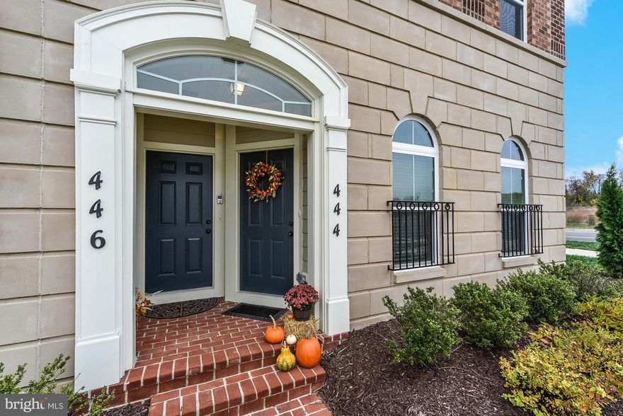 Absolute Perfection! Beautifully designed and decorated end unit condo w/ tasteful finishes. Open floorplan, abundant natural light, crown moulding, granite countertops, SS appliances, sep laundry room w/xtra storage, private balcony, scenic views & much more.  Award winning community design features new-urbanism concept, integrating nature, amenities and walkability.  Metro, MARC, I270 all close.