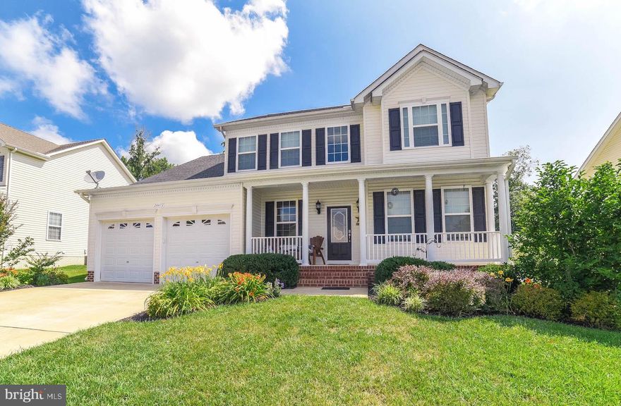 Beautifully landscaped Newport build by Quality Built Homes in the sought after community of Broad Creek.. This 5 bed 3.5 bath home backs to tree and is fenced in to provide maximum privacy.  Enter from the cover front porch into the foyer with pre-finished hard wood floors. the first floor features formal living space (sitting room and dining space), kitchen with granite counters, 42" cabinets, gas cook top, double wall ovens, over the counter microwave, and dishwasher, and eat in area, also the first level features a family room area with gas fireplace and 1st floor laundry room.the 2nd level boasts 4 spacious bedrooms (one being the master suite) and a hall bathroom.  The Master suite provides a huge walk in closet and the famous deluxe master bathroom that Quality Built Homes in known for featuring double vanities, water closet, and a massive shower with double shower heads.  The basement hosts a full bathroom, additional bedroom (5 total in the home), flex space, and a theater area.  within the fenced in back yard (white vinyl fence) there is a great patio, space for grilling, and mature landscaping making this the ultimate oasis.