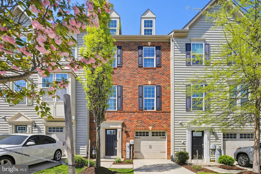 Welcome to 7321 Summit Rock Rd—an exceptional 3-bedroom, 2 full and 2 half bath townhome that seamlessly blends modern elegance with everyday comfort. Built in 2015 and meticulously maintained, this residence showcases features that offer a truly turnkey, move-in-ready experience.

The entry level sets a sophisticated tone with rich hardwood flooring, a newly added half bath, and a versatile bonus space—ideal for 4th bedroom, a private home office, fitness studio, or elegant lounge. Direct access to the one-car garage enhances both convenience and functionality.

Ascend to the main living level, where natural light pours into a beautifully designed open-concept space. The gourmet kitchen is a true centerpiece, featuring granite countertops, stainless steel appliances, 42-inch cabinetry, and an expansive center island—perfect for both casual dining and effortless entertaining. The adjoining dining area opens to a premium TREX deck, creating a seamless indoor-outdoor flow ideal for al fresco dining or relaxing evenings. A spacious living room with soaring ceilings, along with an additional half bath, completes this level with style and ease.

The upper level offers a  sun-filled primary suite, complete with a generous walk-in closet and an ensuite bath featuring a walk-in shower. Two additional well-appointed bedrooms, a full hall bath, and a conveniently located laundry area provide both comfort and practicality.

Ideally situated near premier shopping, dining, and entertainment—including Anne Arundel Mall—and offering easy access to I-95 and Route 100, this home delivers an exceptional blend of luxury, convenience, and lifestyle.

Don’t miss the opportunity to call this remarkable home your own!