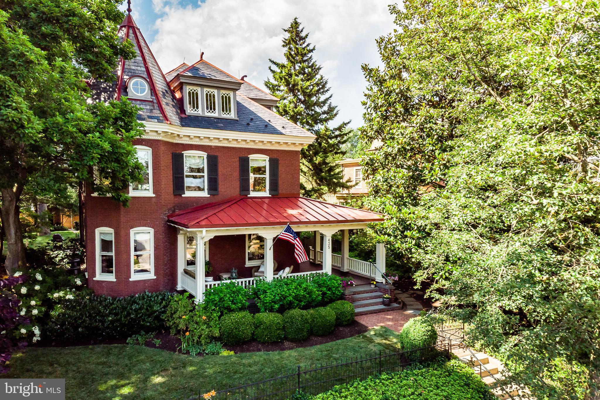 WOW! Quintessential West Chester charm meets modern luxury in this single brick Victorian located in one of the Borough's loveliest neighborhoods. This architectural masterpiece is truly one of a kind, maintaining its antiquity while equipped with all the necessities for present-day living. Set on a spacious lot with well developed gardens, private back yard, and peaceful slate terrace, this property is a sanctuary for unwinding or entertaining. The kids and dogs will love being half a block away from the beautiful Everhart Park! 2020 renovations include new exterior paint and new front porch deck and supports. 2019 renovations include standing seam metal roof on porch and new stockade fence and gates. Rear asphalt shingle roof, new water heater, new natural gas boiler, and high velocity AC all installed within last 9 years. The back boasts a sweet reconstructed cedar shake shed with electricity. The chestnut staircase and woodwork in the foyer are something to behold as you enter this historic oasis. Striking stained glass window on the stair landing lets in the light, while morning sunlight streams in through the windows in the front living room, complete with new gas fireplace in 2019. Windows encircle the dining room so you can share meals in the warmth of a sun-drenched room. The gourmet kitchen will be your new favorite spot! With total gut renovation in 2017, you're looking at sophisticated Rutt cabinetry, Subzero refrigerator, Wolf stove/oven, and all new Marvin windows. The bright granite countertops and massive center island allow for easy eating in. Head right out to the terrace after dinner to enjoy a glass of vino fresh from your wine cooler! Master suite's crisp shaker shutters and neutral tones greet you as you enter. Take advantage of ample space in gorgeous walk-in closet. Master bath is immaculate with large walk-in shower, luxurious freestanding tub, and private rooftop terrace. Three additional bedrooms are airy and light-filled, and the dazzling study offers a great work from home space. 2 full baths and powder room all extensively renovated in 2011-2012. Children of all ages will enjoy the cozy 3rd-floor turret room! Basement includes all new stairs, laundry and storage area, and holds an additional Subzero fridge. Rustic brick arches open to brand new wine room. This sensational home embodies timeless elegance with heavy antique chestnut doors, carved fireplaces, and unique woodwork throughout... a rare opportunity and must-see!