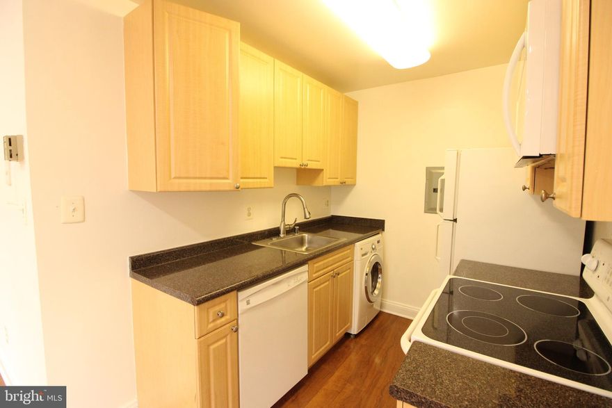 Professional Photos to be Updated ; This Studio is remarkably maintained and ready for you to make it home for many years. Washer/Dryer combo machine, hardwood floors, updated kitchen, and modern lighting will have you feeling at ease! Reserved and numbered parking space make coming home less stressful for your city living. Close to DC and 495. Lots of commuter routes right outside the community for bus connections to metro.