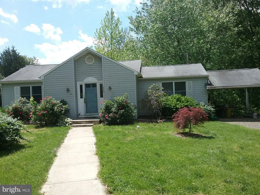 Set on approximately 2.7 mostly cleared acres, this versatile property offers endless possibilities with two separate dwellings, extensive outbuildings, and room to grow. Mature bamboo plantings create a private setting while still providing wide open usable space.
The main residence is a beautifully expanded and remodeled detached home featuring 3 bedrooms and 2 full baths. Originally built in 1955, the home blends character with updated living spaces and is certified Lead Free. Highlights include a spacious living room addition with ceramic tile flooring and a wood stove, plus a carport, deck, and storage shed. A tranquil fish pond and water feature enhance the front yard’s natural appeal.
A second dwelling — a tenant-occupied manufactured home — offers 2 bedrooms, 1 full bath, and 1 half bath, along with its own storage shed. Ideal for rental income, multigenerational living, guest quarters, or a private home office.
The property also features a large barn with additional covered storage areas, making it perfect for equipment or vehicle storage, workshop space, hobbies, or future development potential.
Whether you are seeking an income-producing property, space for extended family, or a unique live/work opportunity, this one-of-a-kind property delivers flexibility, privacy, and potential in a peaceful setting.
