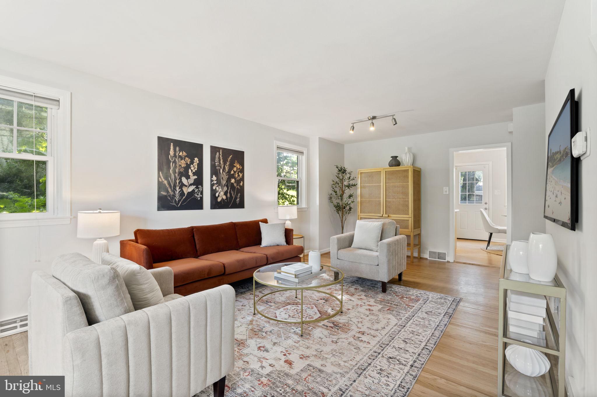 Welcome to 223 Windsor Ave, a bright and inviting twin tucked into a friendly Upper Darby neighborhood. Step inside to a sun-drenched family room that sets the tone—warm, welcoming. A convenient coat closet and thoughtfully placed half bath add function to the beautifully lit space. The eat-in kitchen offers generous cabinet storage and opens directly to a lush, green backyard. Upstairs, the spacious primary bedroom features excellent closet space and shares a full hall bathroom with two additional bedrooms—perfectly suited for a home office or guest room. A hallway linen closet provides added storage. The finished basement offers even more versatility with built-ins, a bonus room, and a large unfinished area perfect for all your storage needs. This location offers easy access to major highways, public transit, and shopping. Central heating and cooling system was updated in 2017, and a new hot water heater was installed in 2024.