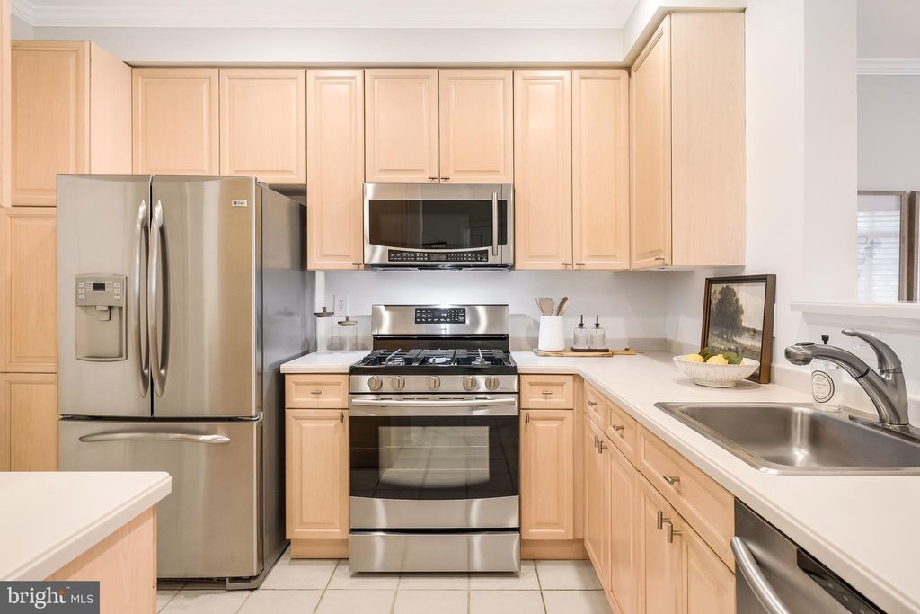 Photo of 1855 Stratford Park Place #303, RESTON, VA 20190 (MLS # VAFX2264912)