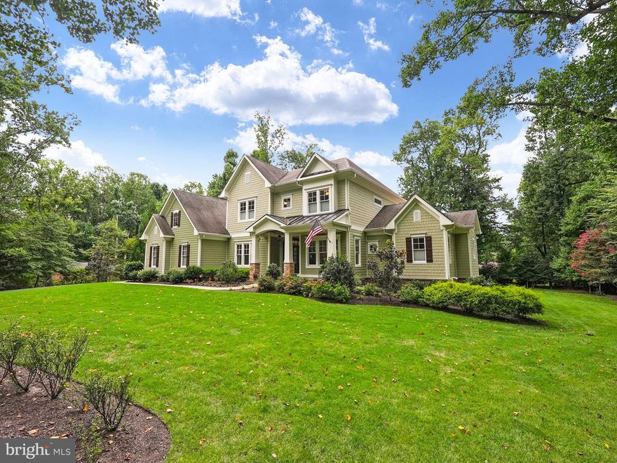 Step into a lifestyle of luxury and tranquility, where comfortable living meets peaceful surroundings. This  distinguished custom-built residence is set on a serene, parklike one-acre lot, offering both tranquility and close proximity to the vibrant town of Vienna. This stunning home features 5 spacious bedrooms, 4.5 beautifully appointed bathrooms, and 4,541 sq ft of luxurious living space on the upper two levels, all situated on meticulously landscaped grounds – ideal for adding a pool. The main floor boasts an open floor plan with gleaming hardwood floors, freshly painted  and 10 ft high ceilings, creating an open and airy atmosphere with a gorgeous primary suite. The heart of the home is the spacious family room, featuring coffered ceilings and large doors that open to the covered porch, seamlessly connecting to the chef’s kitchen. This inviting space is perfect for relaxing or entertaining, with a cozy working fireplace for cooler evenings. The formal dining room is ideal for hosting memorable gatherings, and you'll also find a versatile home office/library and a sunlit morning room perfect for enjoying coffee and reading. The chef’s kitchen is a culinary haven with a large island, granite countertops, stainless steel GE Monogram appliances, a gas stove, under cabinet lighting, and a range hood.  Enjoy the convenient butler's pantry as well as the mudroom  with main floor laundry facilities and large pantry. The open layout enhances the connection between the kitchen, family room, and outdoor areas, making entertaining a delight. The main floor primary suite is a private sanctuary, complete with an ensuite bathroom featuring a separate shower, double sink vanity, and a walk-in closet. The suite offers serene garden views, enhancing the tranquil ambiance.  Upstairs, you’ll find generously sized bedrooms with ample closet space and new carpet.. Bedrooms 1 & 2 offer en-suite bathrooms and bedroom 3 & 4 share a Jack and Jill bathroom. Additionally, there is a spacious bonus room/recreation room and 2nd floor laundry room.  The full basement with 9 ft ceilings provides endless possibilities offering additional approx 2600 sq feet featuring rough-in plumbing for a bath and wet bar, as well as framing and electricity already in place. This space is ready for you to customize and create your dream entertainment area, fitness room, or additional living quarters. Outdoor living is a delight with a stone patio, a covered porch, and a private yard surrounded by mature landscaping with underground sprinkler system and a  partial fence for added privacy. The side load 3 car attached garage and private entrance provide convenience and security. This home effortlessly combines elegant design with thoughtful functionality. Experience the best of both worlds – a serene, private retreat just minutes from the amenities and charm of Vienna. Don’t miss the opportunity to make 2550 Babcock Road your new home. Fairfax county schools: Flint Hill ES/Thoreau Middle/James Madison HS. Commuters Dream just minutes to Vienna metro. Schedule a viewing today and imagine the life of comfort and luxury that awaits you. *************OPEN HOUSE 8/25/2024 from 1-4 pm!