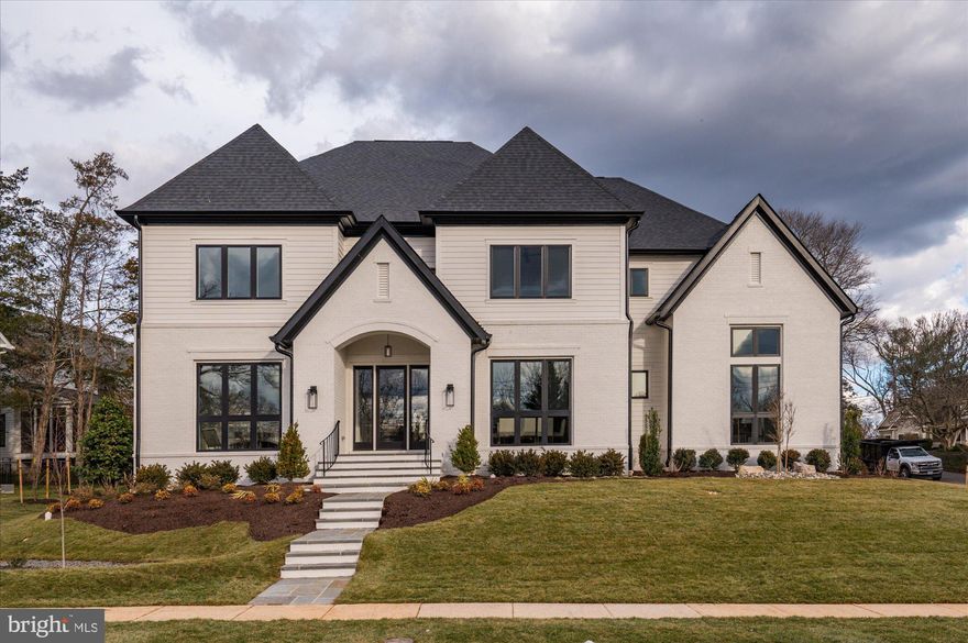 Cherry Hill Custom Homes presents this beautiful transitional design on a quiet street in the Kent Gardens area of McLean. This home features 6 bedrooms, 6 full bathrooms, and two powder rooms with 7100 square feet of finished living space on three levels. The main level boasts 10ft ceilings, gorgeous wide-plank European White Oak engineered wood floors, a gourmet kitchen with Subzero 42" refrigerator, and 48" Blue Star range, frame-less custom cabinetry and quartz countertops. Through the butler’s pantry is a large formal dining room for an unforgettable dining experience. The great room with gas fireplace and tile surround opens to a screened porch and rear patio with Virginia Blue Stone. A guest suite/ private study and a formal living room complete the main level living spaces. The upper level is highlighted by a luxurious primary suite with dual walk-in closets with built-ins, a spa-like bathroom with heated floors, double vanities, stand-alone soaking tub, and heavy glass enclosed shower, three ensuite bedrooms, and a spacious laundry room. The lower level features a rec room with wet bar, an exercise room, an additional ensuite bedroom, a separate powder room, and a large storage space. There is also a built-in elevator shaft for optional conversion. Convenient to Kent Gardens ES/Longfellow MS/ McLean HS, Tuckahoe Recreation Club, downtown McLean, and Tysons.