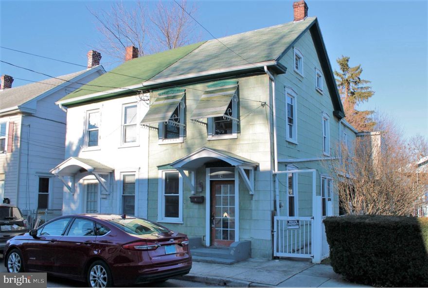 This property is part of an estate.  The estate owns the right half of this duplex.  The property has updated replacement windows throughout.  The home offers much of the original woodwork, trim and there are floor to ceiling columns separating the living room and formal dining room.  The home offers off-street parking via a rear alley way with on-street parking available out front.  Convenient location with easy access to area schools, parks and interstate access.    The home had renovations started but they remain incomplete.   The home is being sold as-is and will need renovations.