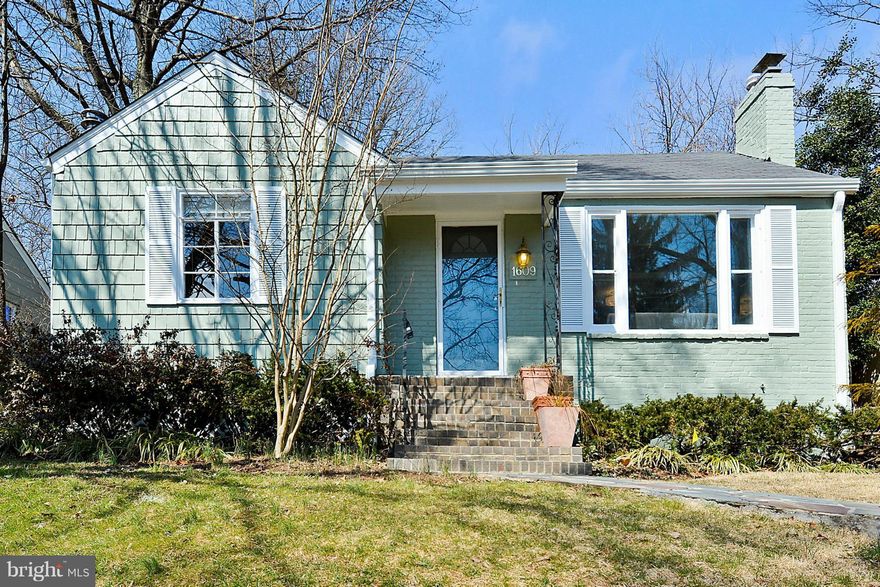 Sunny open floor plan incl LR, DR, & kitchen w/hardwood floors, wood-burning fireplace, large picture window & built-in corner cabinet. Nice-sized bedrooms & updated full bath on main level. LL has family room, second full bathroom & utility/storage. Great yard & patio on quiet street. Prime Woodside location - walk to DT SS, Metro, MARC & buses plus local neighborhood shops!