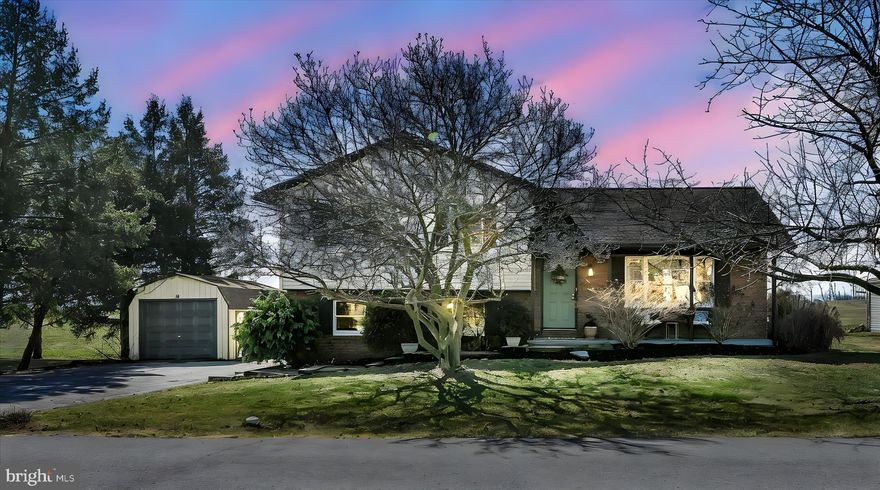 Welcome to this charming 3-bedroom, 1.5-bath split-level home offering well-appointed spaces and plenty of room to spread out- all in a low-maintenance setting. Nestled on a quiet cul-de-sac in an established neighborhood, this home combines comfort, functionality, and beautiful surroundings.
The main level features a bright and inviting living area that flows seamlessly into the dining space and kitchen, where stainless steel appliances are included and abundant natural light fills the room. Upstairs you’ll find three comfortable bedrooms and a full bathroom. The lower level offers a cozy den area with a convenient half bath, along with a spacious sunroom- perfect for relaxing, entertaining, or enjoying peaceful views of the surrounding countryside. The basement provides a large, bright space ideal for recreation, hobbies, or additional living space, and also serves as the home’s laundry area. Outside, enjoy a small, efficiently sized yard designed for easy upkeep, along with stunning field views that stretch for miles. Two sheds provide plenty of additional storage.
Full of charm, style, and personality, this adorable home offers the perfect blend of cozy living and practical space in a peaceful location.