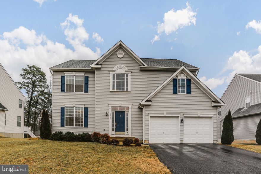 Gorgeous 4BR colonial on large lot. This must-see home boasts a gourmet kitchen w/ island, granite counters, stainless steel appliances & breakfast bar opening to sunroom. Gleaming HW floors throughout main level & open floor plan. Upstairs features new carpets & large bedrooms including a master suite w/ walk in closet and spacious bath. 1200 sq ft basement is ready to finish w/ rough-in for bath