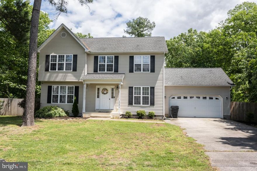 Welcome to your dream colonial home nestled in the picturesque waterside community of Golden Beach! This meticulously cared for residence boasts 4 bedrooms, 2.5 baths, and sits gracefully on a spacious .34-acre lot. As you step into the grand foyer, you're greeted by an inviting atmosphere, with a formal dining room on one side and a luxurious living room on the other. Follow the hallway to discover the heart of the home—a generously sized kitchen featuring stainless steel appliances, ample counter and cabinet space, and room for a dining table. The kitchen seamlessly flows into a cozy family room adorned with a charming gas fireplace, perfect for intimate gatherings or relaxing evenings with loved ones. Recently painted walls, newly cleaned carpets, and a freshly painted deck add to the allure of this residence, offering a turnkey experience for its lucky new owners. A spacious laundry room equipped with a convenient utility sink and a roomy 2-car garage complete with a newly purchased garage door opener, ready for installation by the buyer, enhance the home's functionality.

Regular HVAC maintenance and recent servicing of the well and septic systems ensure peace of mind for years to come. Outside, the expansive backyard beckons for outdoor enjoyment, featuring a fully fenced yard ideal for privacy and safety, while the large deck sets the stage for memorable BBQs and entertaining under the open sky. Upstairs, retreat to the tranquility of four generously proportioned bedrooms, including a primary suite boasting a walk-in closet and an en suite bath for added comfort and convenience. The hallway bath serves the remaining bedrooms with style and functionality. The home sale includes a complimentary one-year home warranty. Plus, residents of Golden Beach enjoy access to a range of community amenities for a truly enriched lifestyle.

Don't miss the opportunity to make this stunning colonial home your own oasis in the esteemed Golden Beach community. Schedule your showing today and start living the lifestyle you've always dreamed of!