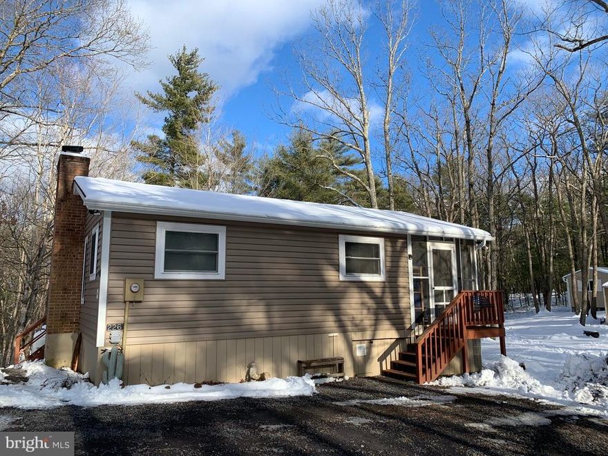 Lovely, private, cozy cabin on over 3 acres of wooded land. Well maintained cabin with updated features added in 2017 to include, propane service installed, vinyl siding, new gutters with guards, water softener, tankless water heater and gas range to name a few. Also has a screened porch to enjoy.  A must see!