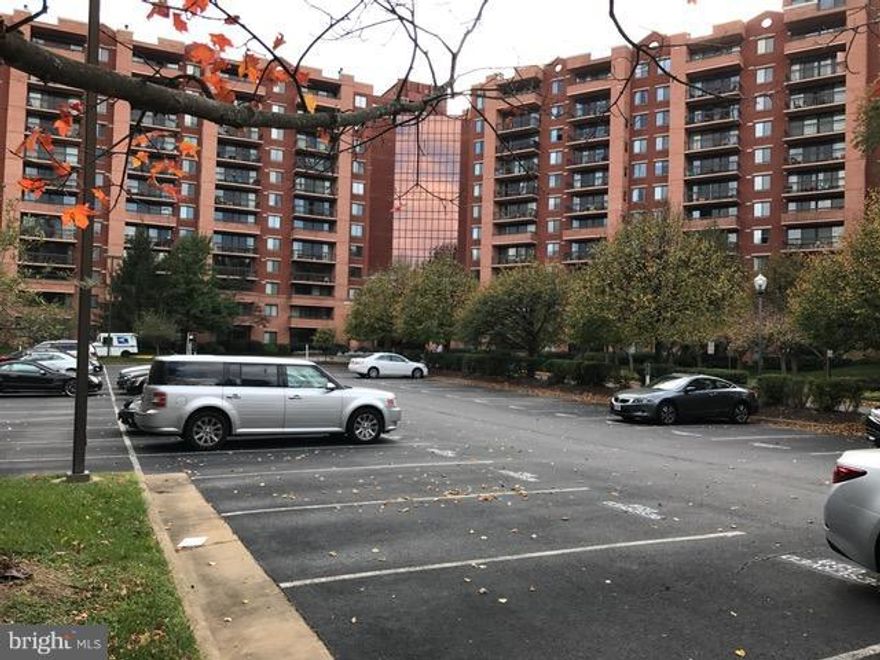 Facing the quite side of the building, Gourmet kitchen w/Granite & Stainless Steel, Ceramic Tiles, HW Floors, Washer/Dryer in unit, Large Balcony, Walk-in Closet. Condo amenities: Gated Comm. 24hr Front Desk, Gym, Sauna, Club Room, Billiards; Pool and Tennis courts year-round. Close to Tysons Corner, Whole Foods, Trader Joes, Silver Line Metro, Shuttle to Metro & major commuter routes.