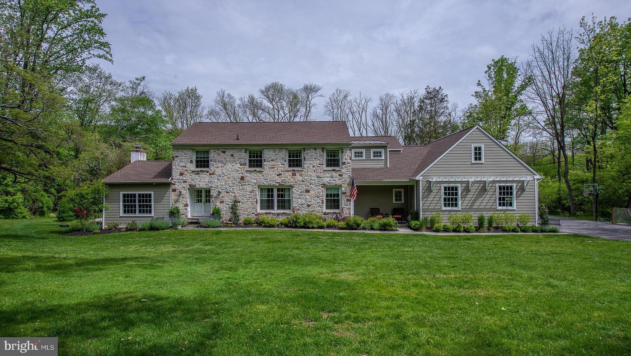 Decide now to live in this beautifully remodeled home. The sellers added 2,000 square feet enlarging the 1st & 2nd floors. During renovations, a 3-car garage was created; the exterior vinyl siding was removed, insulation added and new cement siding installed; new roof - Lifetime Architectural Shingles; Master Suite w/Master bath created and laundry moved to the 2nd level. Additional changes include a den/5th bedroom on main level, a huge mudroom with porcelain flooring, an enlarged gourmet kitchen with all the bells and whistles including customized walk-in pantry, sliders to a maintenance-free deck and a finished lower level including the 4th full bath. Drive down the long driveway and enjoy the privacy of this 4/5 bedroom 4.1 bath home on 2.3 acres in T/E school district. As you enter through the main front door, be wowed with the new gorgeous hardwood floors found throughout the main level. The step-down formal LR features a fireplace with marble hearth, the newly enclosed office space (originally a front porch) with entry via French Doors and huge windows invite tons of natural light into the room. The formal DR offers built-ins & entry to the gourmet kitchen via the Butler s Pantry with built-in wine cooler. The enlarged kitchen is stunning & boasts a custom built pantry, a huge island - 10 X 4 wide, a 6-burner Thermador cook top with double oven, Sub-Zero refrigerator, Kohler Farmer s Sink and soft-closing wood cabinets made exclusively for this owner. Quartz counter tops, tile back splash, 2 dishwashers, 2 sinks, over 30 drawers & so many cabinets that the storage is truly ample. The Sharp Microwave is built-into the island, the Kitchen Aid is the main dishwasher while Fisher/Pykel has a drawer in the island for additional washings. The eat-in kitchen features sliders to the Timber tech deck overlooking the in-ground pool. Completing the main level is the den/bedroom with closet, the mudroom with porcelain flooring, looks like hardwood, and entry to the 3-car garage. The 2nd level has 4BR 3 full baths, laundry and huge Master Suite with walk-in custom closets. The large Master Suite created in 2016 boasts a sitting/work-out room and huge Master Bath. The MB has Porcelain heated Flooring, double vanity, large stall shower w/ 3 shower heads, private Loo and linen closet. 3 additional BR & two additional full baths and laundry room complete this level. The lower level is finished, has egress to the back yard & a full bath. There are two zones, propane heat & cooking, 2 Electric water heaters, newer furnace, PEX plumbing system. This home sits on 2.3 acres of level land and is minutes from major arteries - routes 202, PA turnpike and route 30. Just move in- nothing to do but unpack.