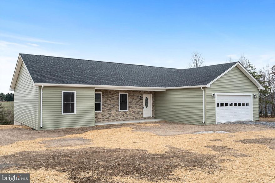 *** COMPLETE AND SUPER AFFORDABLE 1,650 SQ FT SPACIOUS RANCHER ON OVER 2 ACRES … JUST OVER VA LINE AND NO HOA!*** Located in a small, rural subdivision called Mohrs Landing and just 20 minutes from Winchester, this is the one level NEW CONSTRUCTION living that you’ve been waiting for! This split bedroom plan is finished in a neutral palette of white kitchen cabinetry, stainless steel appliances, luxury vinyl planking THROUGHOUT home including bedrooms and baths. Nice sized decking off rear overlooks gorgeous mountain vistas and level 2-acre lot. PART OF POND IS LOCATED IN REAR OF PROPERTY FOR GREAT ACCESS! Front covered porch area allows for relaxing front porch sitting. Large 2 car garage has an additional finished room for storage. Laundry room is conveniently located off garage and primary bedroom. This new home will be a great starter or perfect home for downsizing! You won’t be disappointed by the great quality this home has to offer, as well as a 1-year builder's warranty offered by Signature Homes of WV, Builder.