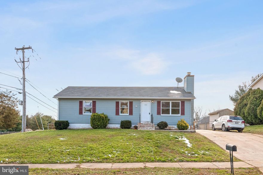 Welcome to your NEW HOME at 343 E Village Rd in the popular Buckhill Farms community! Relaxed, light filled, and modern living await in this gorgeous ranch home nestled on  one of the largest lots in the community -  just under HALF AN ACRE. This one-story floor plan has just been freshly painted and is ready for you to move right in. Featuring 3 sizable bedrooms and recently updated modern bathroom and kitchens, this home is sure to please.  The living room is spacious and graced by a  wood burning fire place - perfect for those cozy winter nights- and has low maintenance vinyl plank flooring which extend to the kitchen and master bedroom. The kitchen has plenty of cabinet space and newer stainless steel appliances, and leads out to the back deck, perfect for entertaining family and friends this summer! There is a huge FULL BASEMENT that mirrors the footprint of the house, offering the potential for even more living space whether you need a 4th bedroom, second bathroom, man cave, home office, or movie theater. A full finished basement would bring this great home to almost 2,200 square feet of living space! With plenty of unfinished space you will never need to worry about storage! Just minutes from the DE line, this amazing home is located close to everything you could need including shopping, parks, and major highways! OWN this home for much less than the cost of renting!