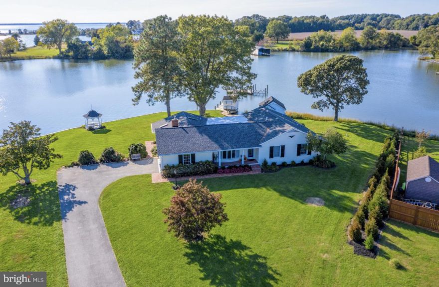 Waterfront Oasis! Welcome home to serenity and glorious water front views! This lovely waterfront 3BR/2.5 Bath rambler is beautifully appointed and has been lovingly renovated with all the modern  upgrades and conveniences you could desire. 
Enjoy relaxing under covered porches or patio, or sitting waterside under the gazebo. There is also a detached studio that can serve as a quiet waterside office, artist space, enclosed waterside dining, or  meditation/gym space; just  so many flexible options for you. 
Inside the home there are 3 ample bedrooms and 2.5 baths. Separate formal front living and dining rooms. Off the kitchen there is a waterside family room with fireplace. The kitchen, family room, sun room and primary bedroom all have gorgeous water views.  Enjoy sitting on, fishing and crabbing from the private pier.Easy access from the protection of Herring Creek to the Potomac River if you want to kayak or boat.  Plenty of parking with the attached 2 car garage and large .61 acre waterfront lot allows for excellent entertaining space. Just 10 minutes to area shopping and  20 minutes to NAS Patuxent River, Historic Leonardtown or Solomon’s Island. Good Credit for all applicants is required (700+). Lawn Maintenance is Included.