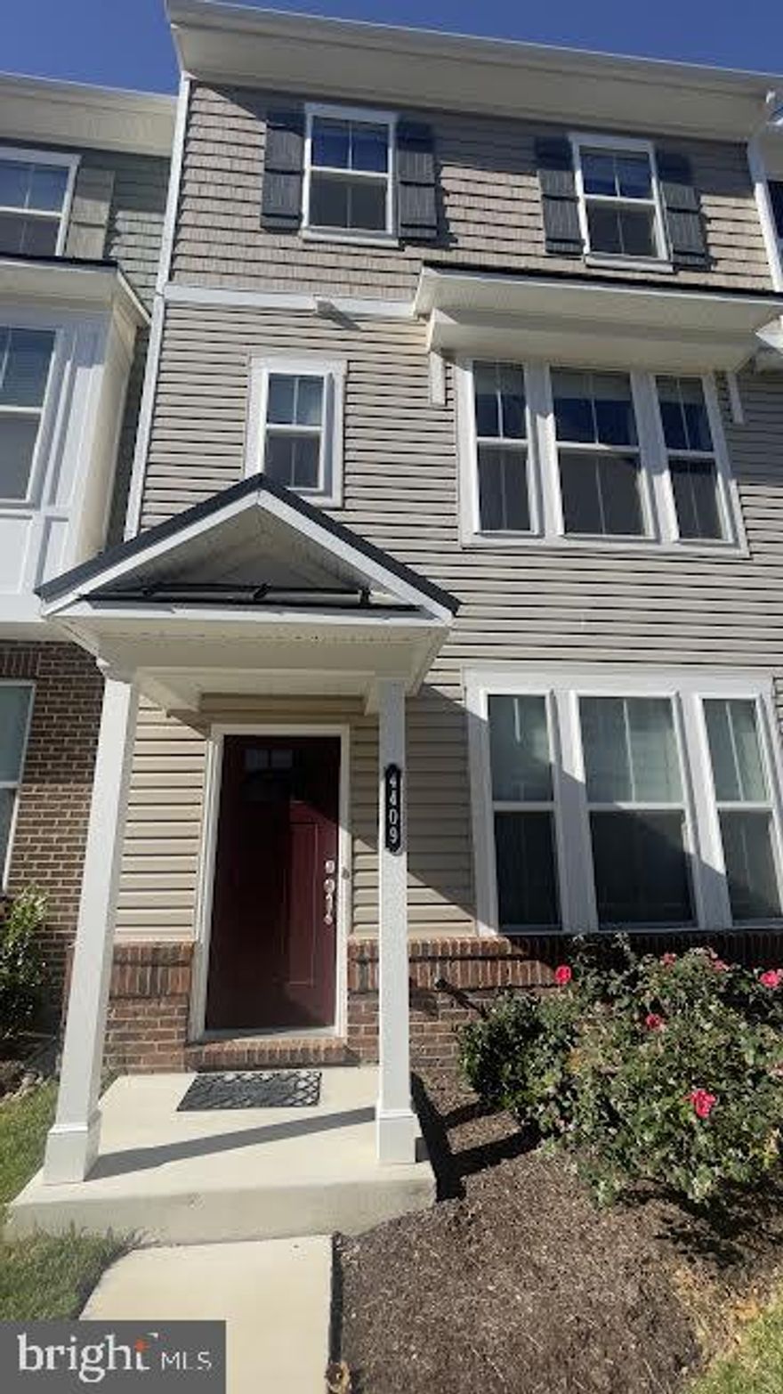 Welcome to this stunning move-in-ready 2022-built 3 Bedroom, 2 Full and 2 Half Bathrooms, 2 Car garage Townhouse in Ellicott City, MD, featuring an open-concept floorplan with abundant space. Step into the Ground Floor (main level) adorned with a hardwood floor, a half Bath, perfect for an Office or bedroom, with access to the 2-car garage. Walk up the wooden stairs to the second floor, and the heart of the home unfolds into a sun-drenched living area, boasting hardwood floors that extend into a gourmet kitchen. This culinary haven is equipped with Quartz countertops, ample cabinet space, a central island for barstool gathering, and sleek stainless-steel appliances, making it a dream for cooking enthusiasts. Adjacent to the kitchen is the dining area and sliding door access to a maintenance-free deck. The top floor is dedicated to a luxurious Master Bedroom suite with a walk-in shower, double vanity sink, and a spacious walk-in closet, epitomizing comfort and style. The two additional bedrooms have plenty of natural light and ample storage space, a full hallway bathroom, and a laundry area. This house is move-in ready with recessed lighting throughout the home. Conveniently located in the heart of the Ellicott City Long Gate neighborhood. Walk to shopping, Groceries, and fitness centers. Top-rated schools in the Howard County School system. 2 minutes to MD-29, MD-70, and MD-100. Close to 295 and I-95, MARC. Easy commute to NSA, Fort Meade, Baltimore, Columbia, and DC.