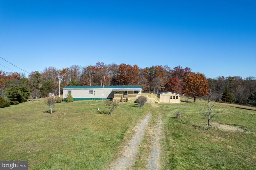 Wow what a cool Mountain Treasure! 2/1.5 bath  home w/980 sq ft with spectacular Mountain Views! All the hard work is done ! New Windows in 2015, new metal roof in 2017,new well pump/pressure tank in 2022 , new furnace in 2019 ,carport/garage and brand new large deck so you can sit and enjoy your fabulous views with your favorite beverage! Property is just beautiful ,lays great  w/ plum and cherry trees and a really nice mix of open and wooded land . Did I mention the location is at the very end of the road for additional privacy ? See this affordable home first and you'll be glad you did !****Back to Active through no fault of the seller  as of 5/31/24***