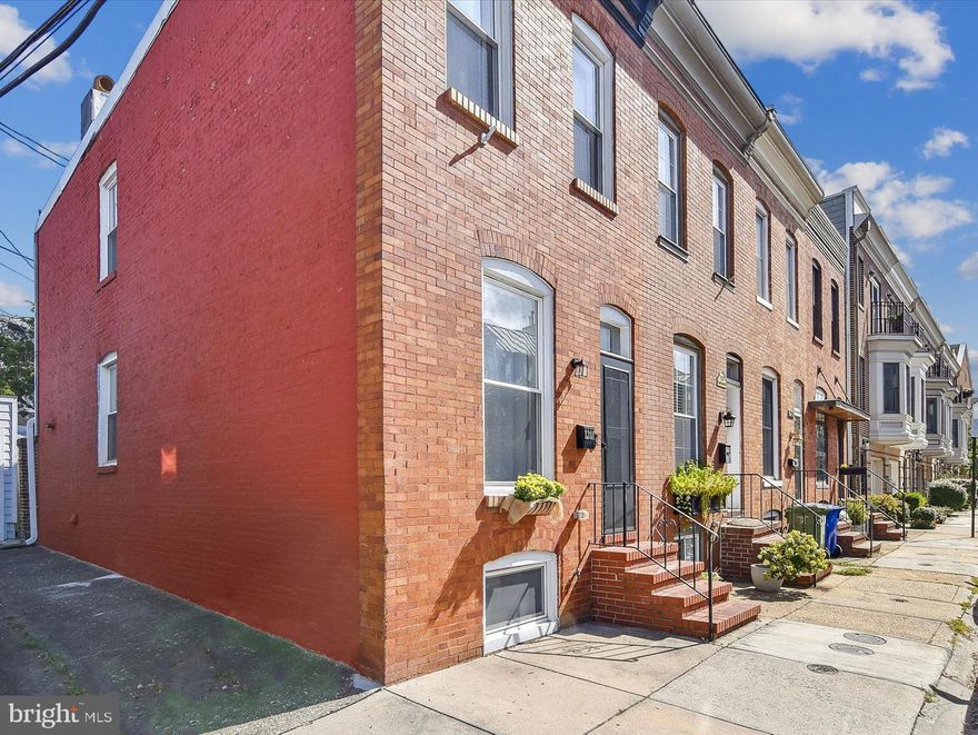 Nestled on a quiet, tree-lined street close to the coveted Canton waterfront, this sophisticated end of group townhome is truly special. Step inside to discover a meticulously maintained interior that combines classic architectural details with contemporary finishes. The light filled open floor plan is highlighted by hardwood floors and exposed brick and provides comfortable options for seating and dining. Easy flow to the eat-in kitchen, with updates galore, then continue through to the private outdoor area, perfect for hosting summer barbecues or enjoying a quiet evening under the stars. A bright open staircase takes you to the lower level where you will find a spacious den, full bath, laundry and so much storage. The second floor provides two bedrooms, another full bath, and lots of closet space. Welcome Home to 1201 S. Bouldin Street, quintessential city living at its best!